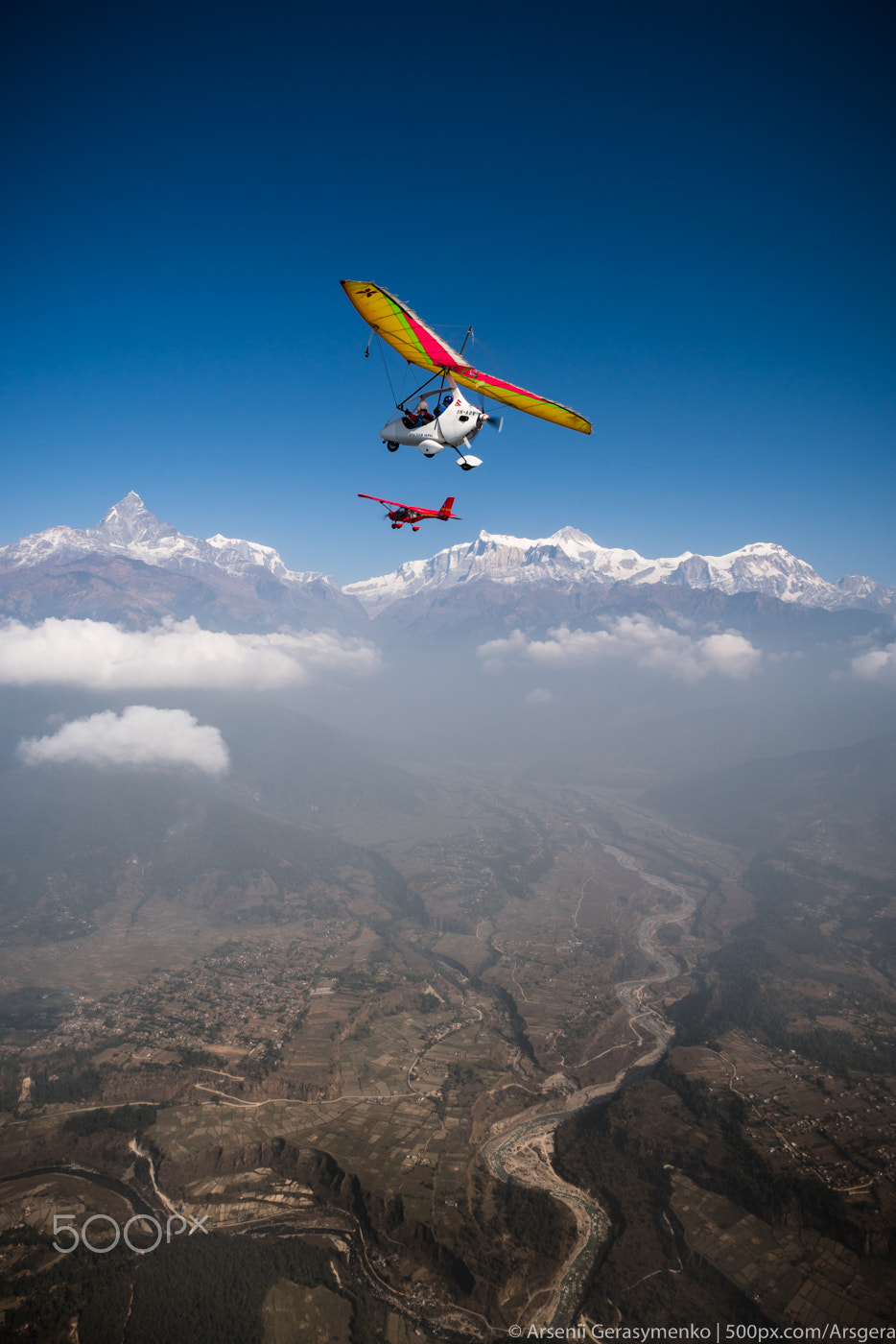Sony a7R II + Sony 20mm F2.8 sample photo. Ultralight trike and plane fly over pokhara and an photography