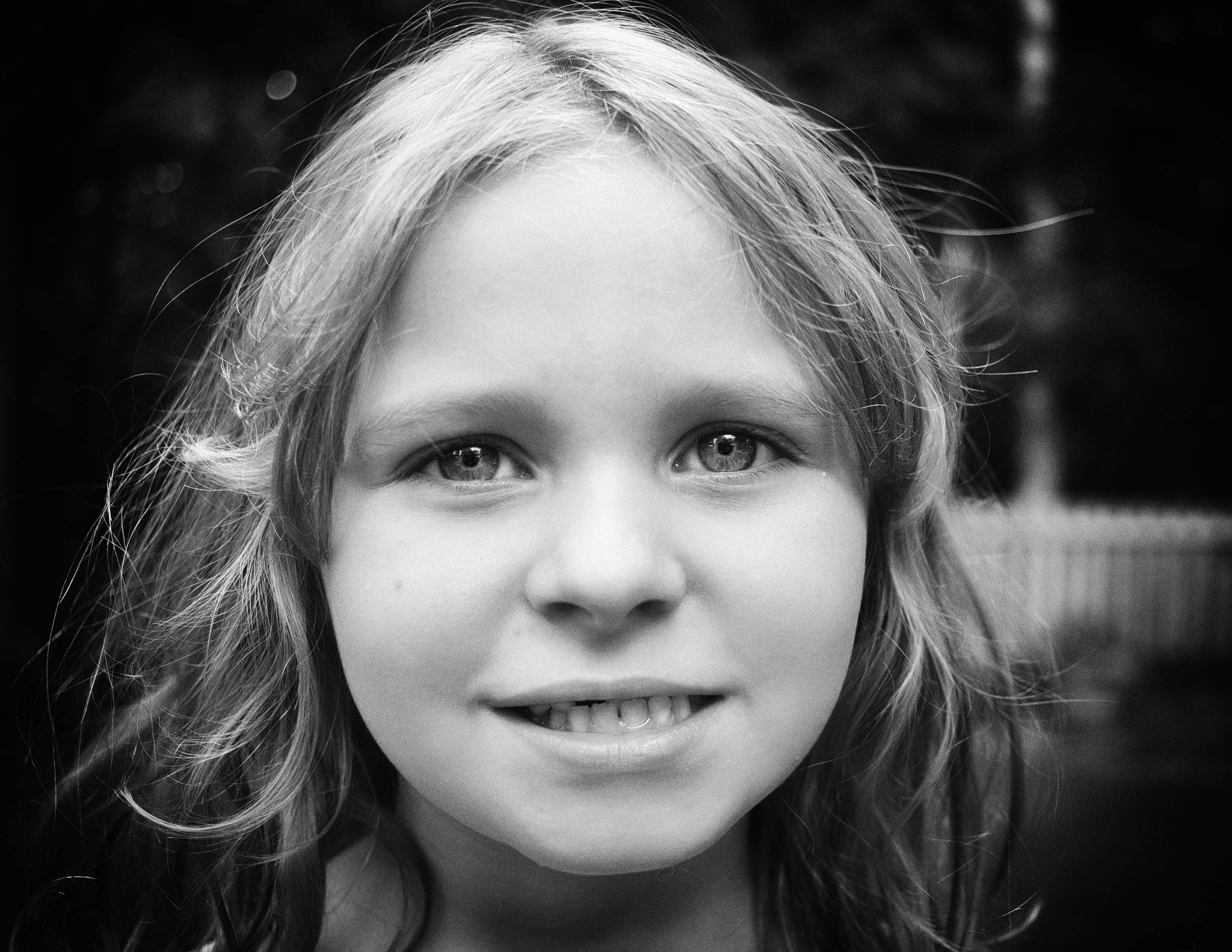 Canon EF-S 24mm F2.8 STM sample photo. What a fake smile photography