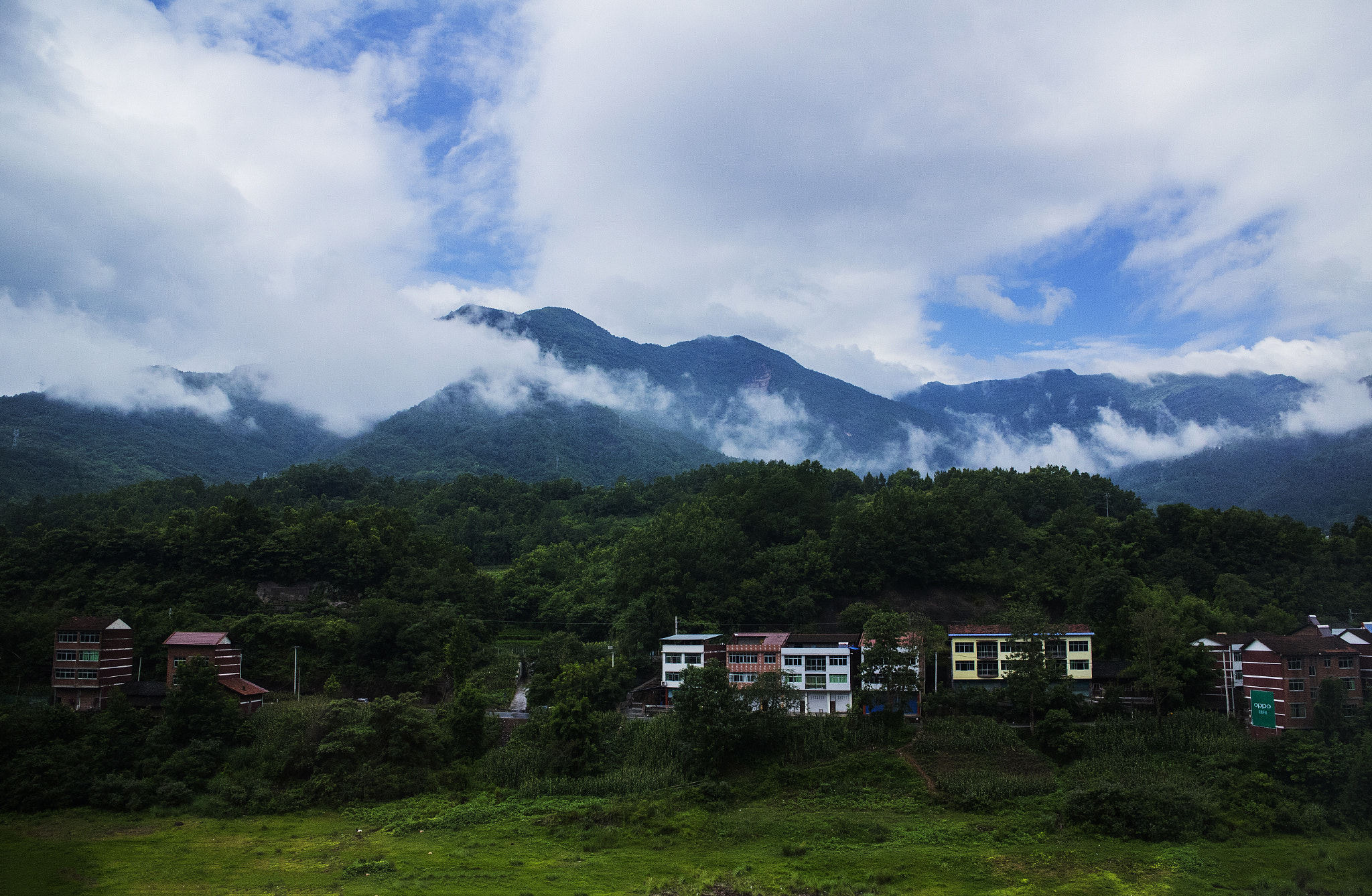 Canon EOS M2 sample photo. A moutain townlet after the rain photography