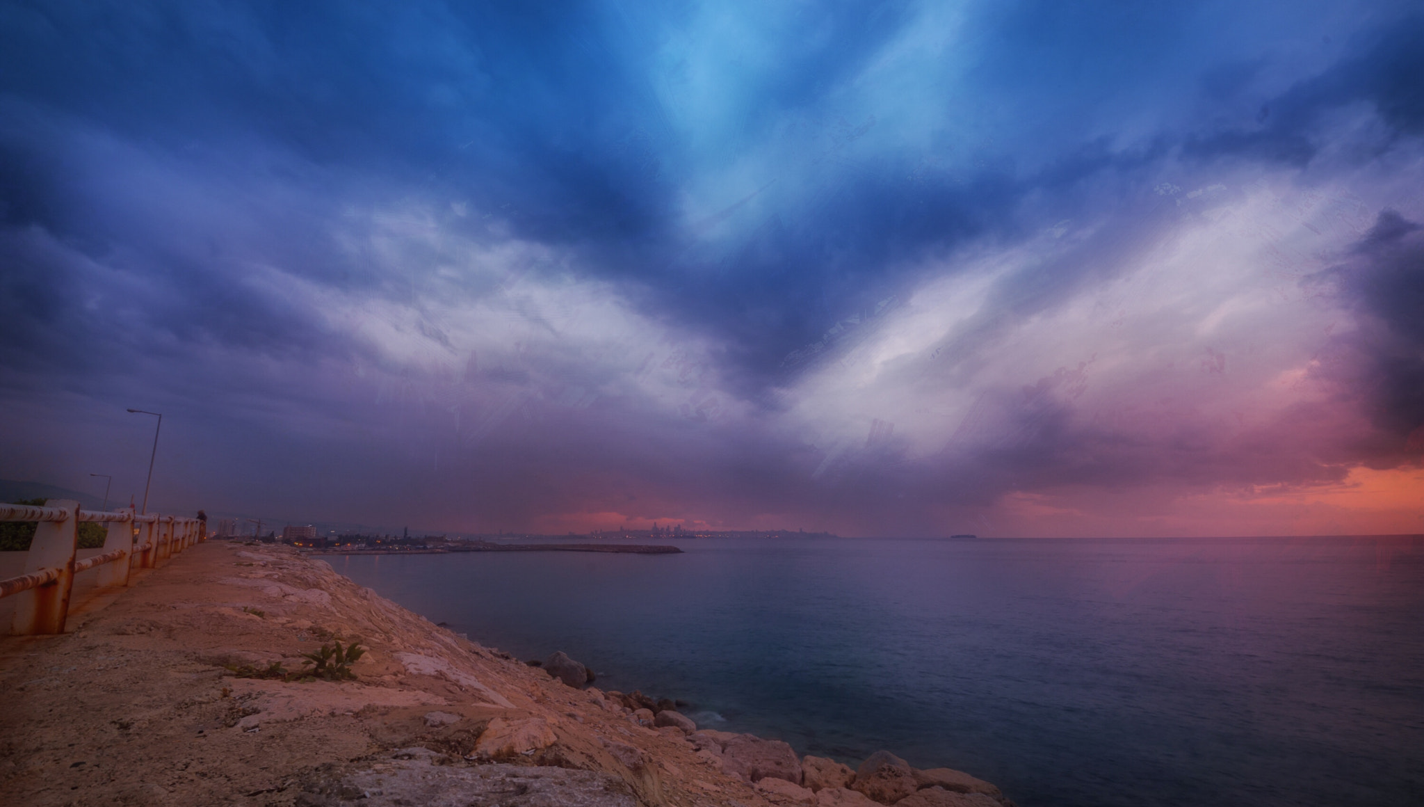 Sigma 8-16mm F4.5-5.6 DC HSM sample photo. Rain clouds photography
