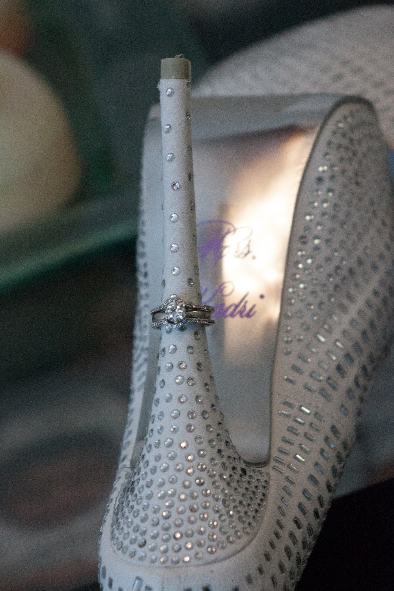 Canon EF 55-200mm f/4.5-5.6 sample photo. Wedding shoe & rings photography