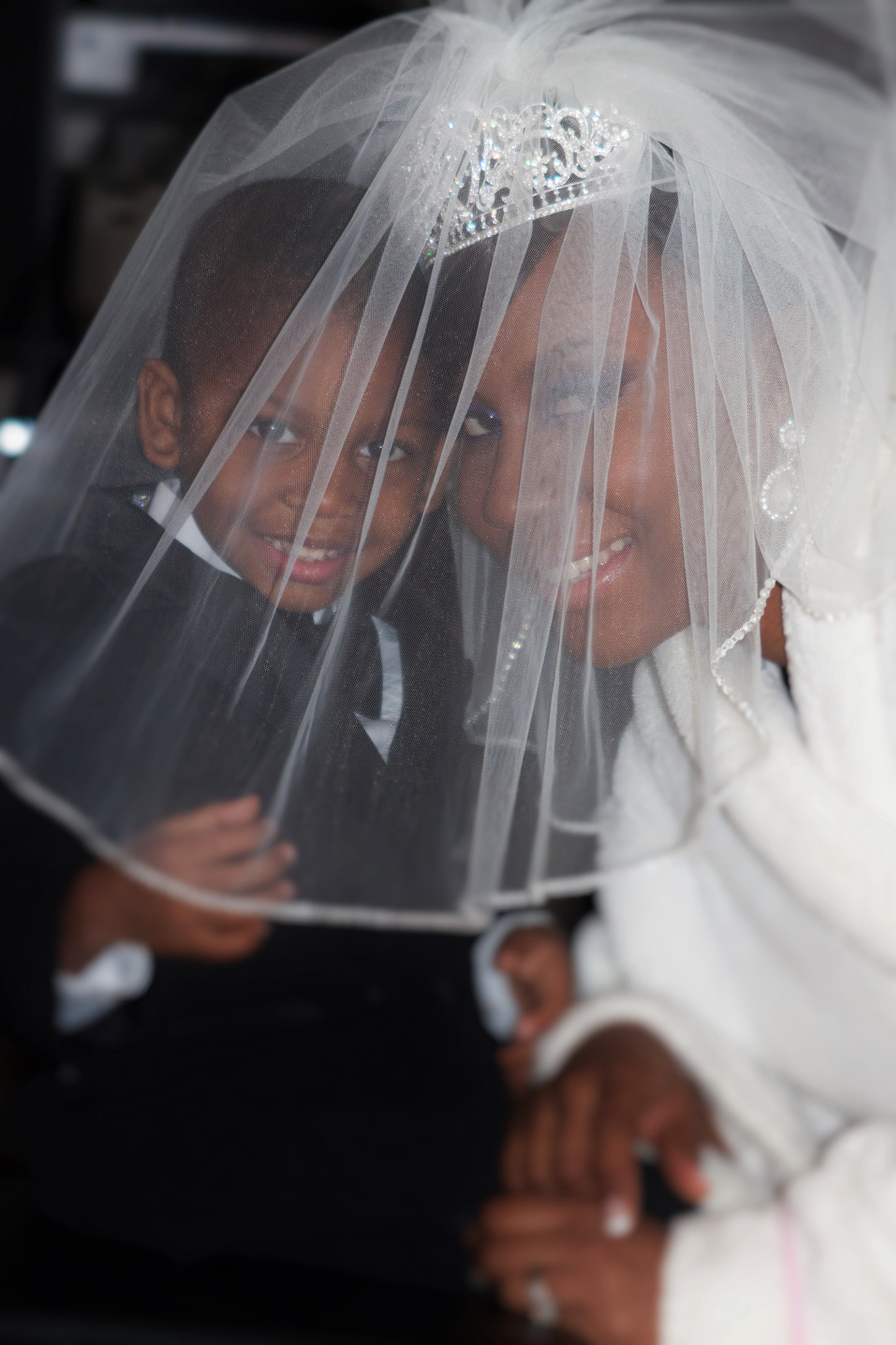 Canon EF 55-200mm f/4.5-5.6 sample photo. Little man & mommy under veil photography