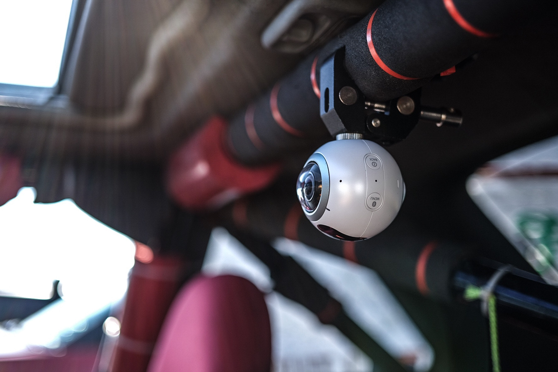 ZEISS Touit 32mm F1.8 sample photo. Samsung's new 360 camera. right where the action is photography