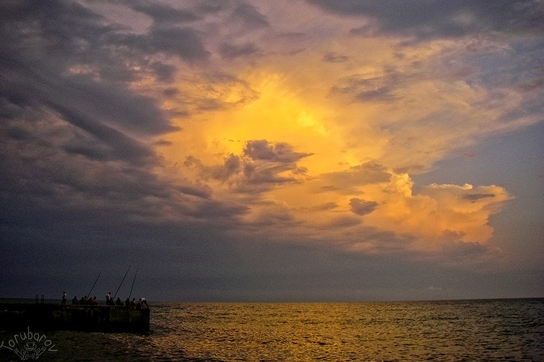 Pentax OPTIO W20 sample photo. Evening fishing photography