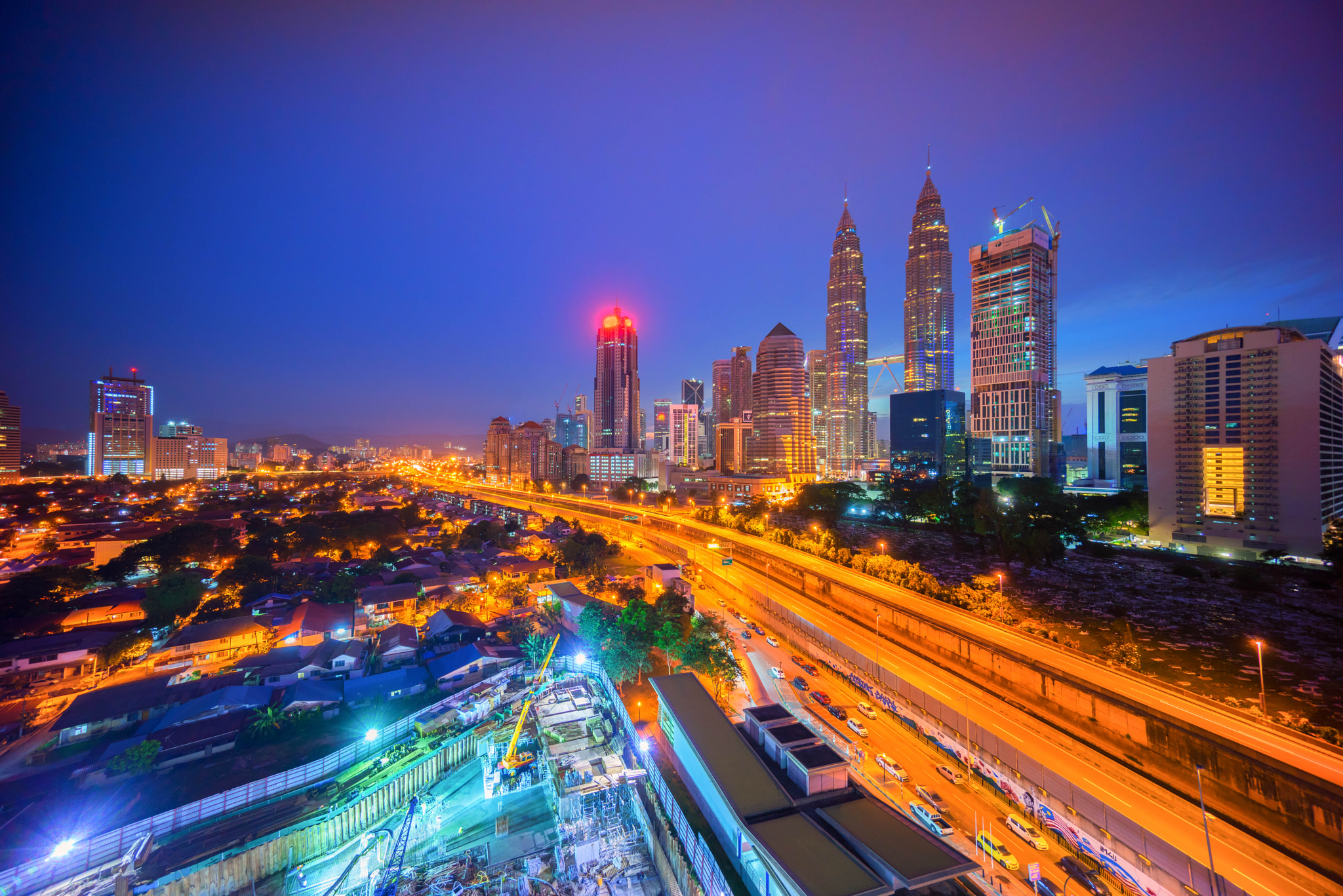 Sony E 10-18mm F4 OSS sample photo. High aerial view of kuala lumpur city during sunrise photography
