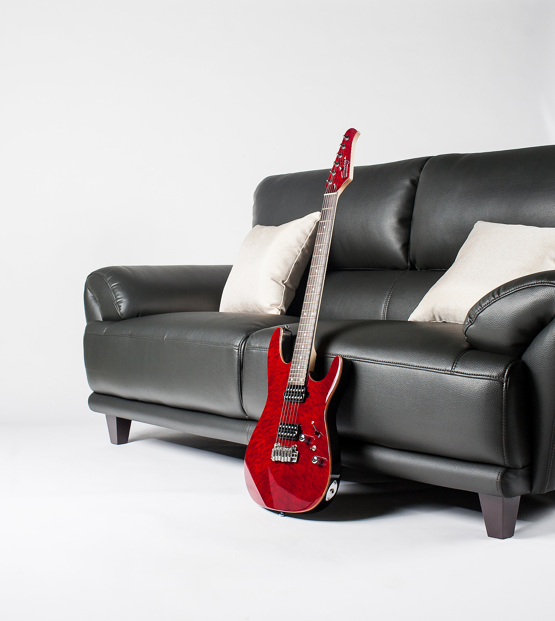 Canon EOS 5D + Canon EF 35mm F1.4L USM sample photo. Sofa and guitar photography