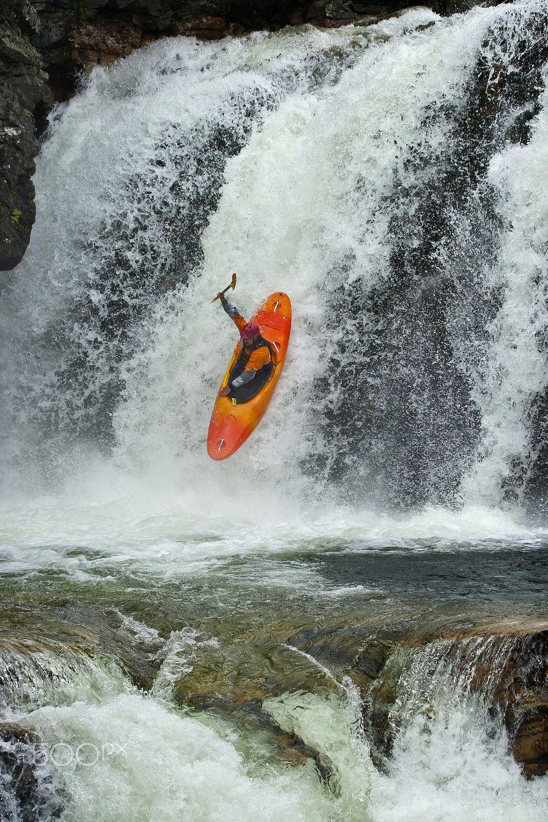 Canon EF 100-400mm F4.5-5.6L IS USM sample photo. Kayaker in the waterfall photography