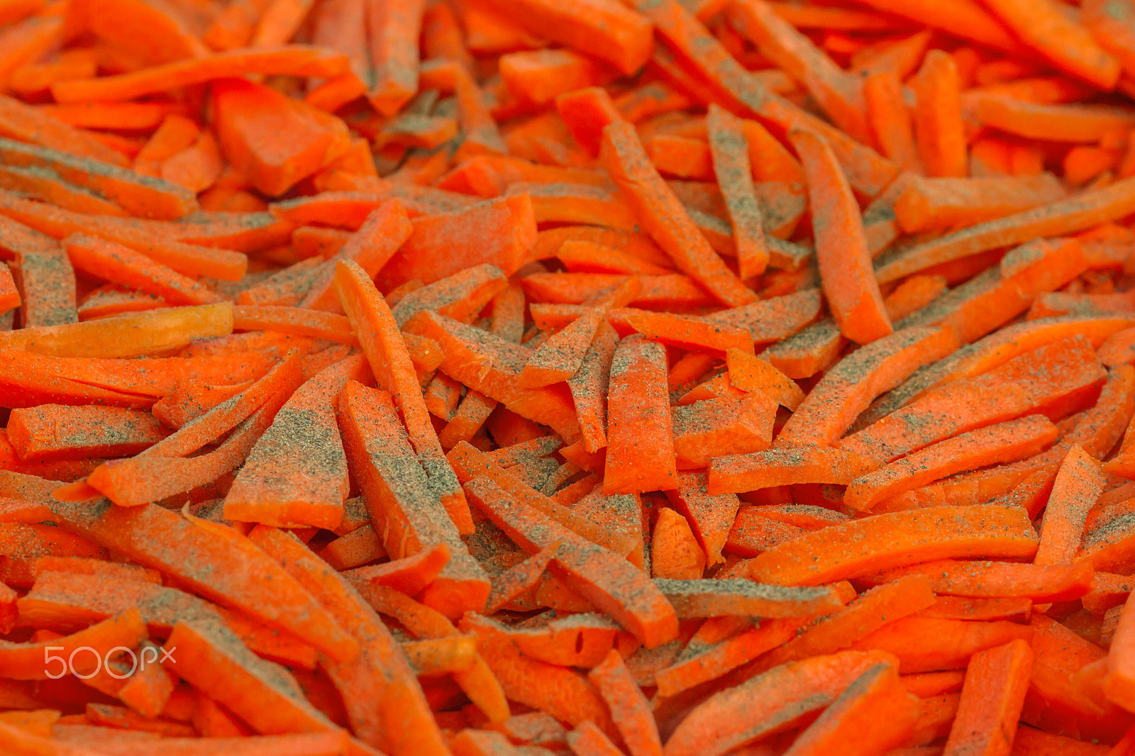 Canon EOS 7D + Canon EF 135mm F2L USM sample photo. Chopped carrots with pepper photography