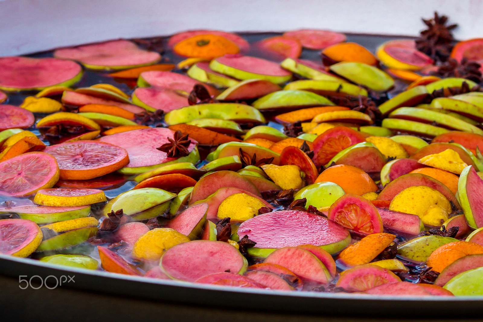 Canon EOS 7D + Canon EF 135mm F2L USM sample photo. Mulled wine in a large bowl photography