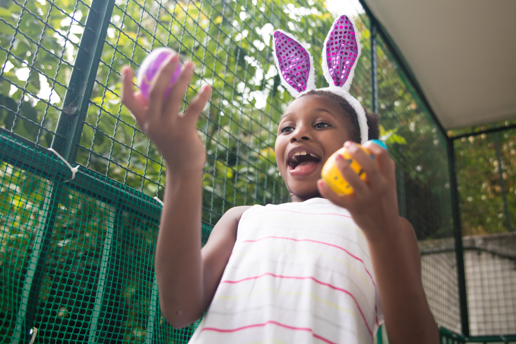 Canon EOS 5DS R + Canon EF 400mm f/2.8L sample photo. Little black girl celebrating easter. photography