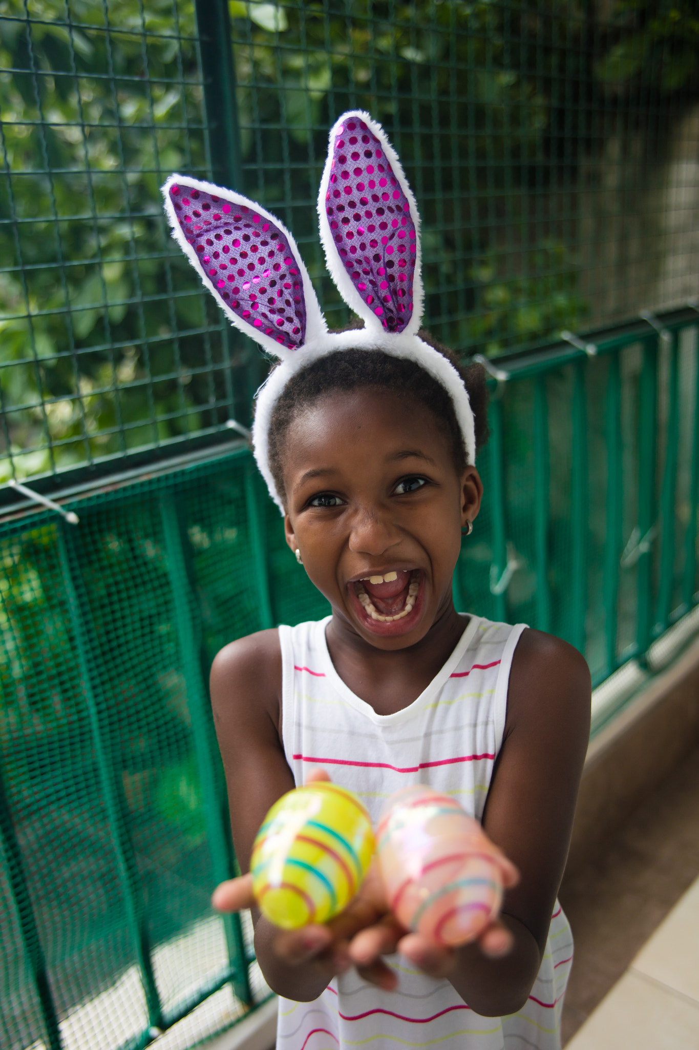 Canon EOS 5DS R + Canon EF 400mm f/2.8L sample photo. Little black girl celebrating easter. photography