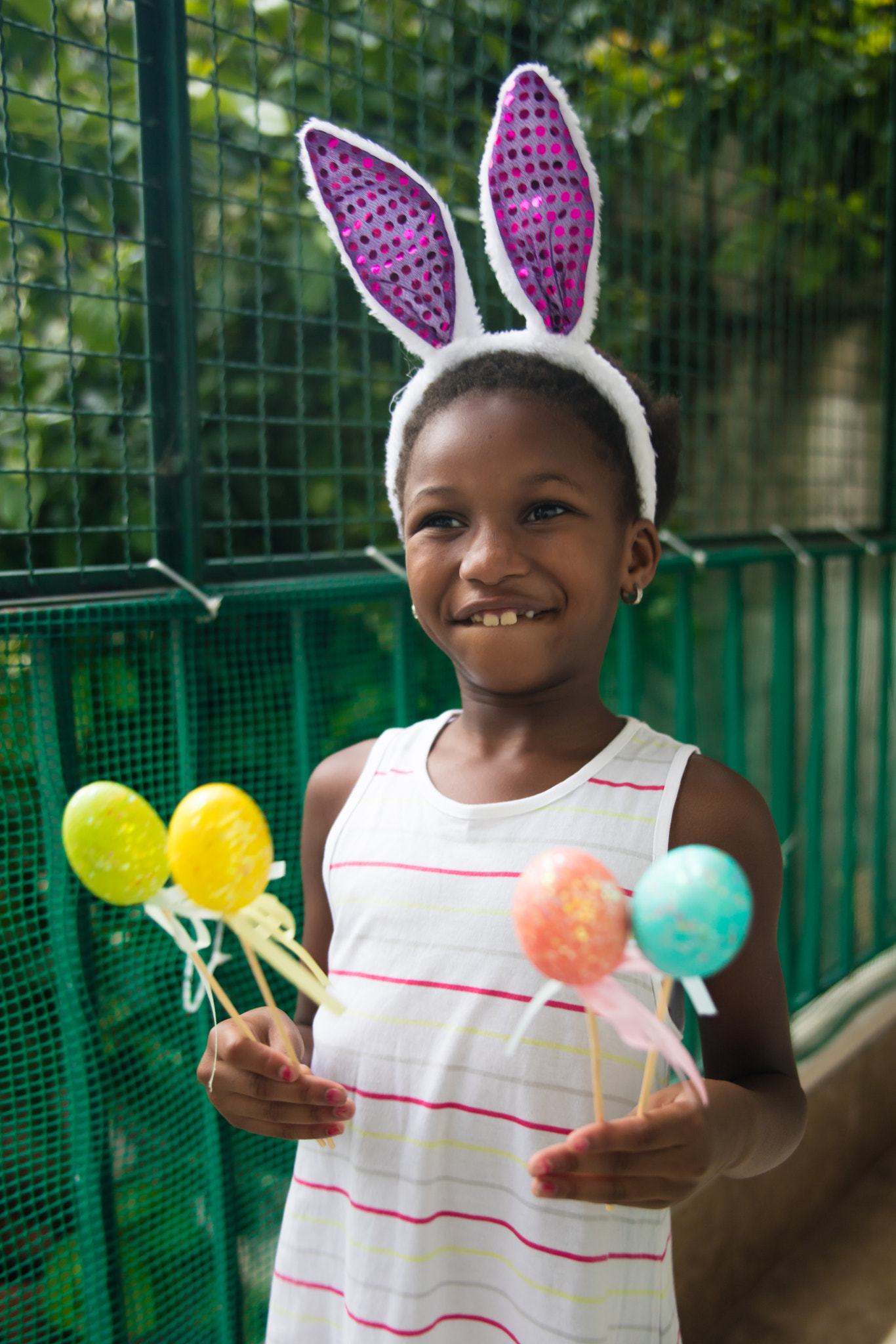 Canon EOS 5DS R + Canon EF 400mm f/2.8L sample photo. Little black girl celebrating easter. photography