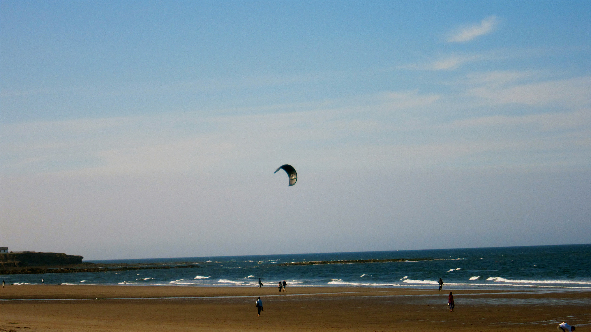 Canon PowerShot SD4000 IS (IXUS 300 HS / IXY 30S) sample photo. On the beach the other day and saw this person ski ... photography