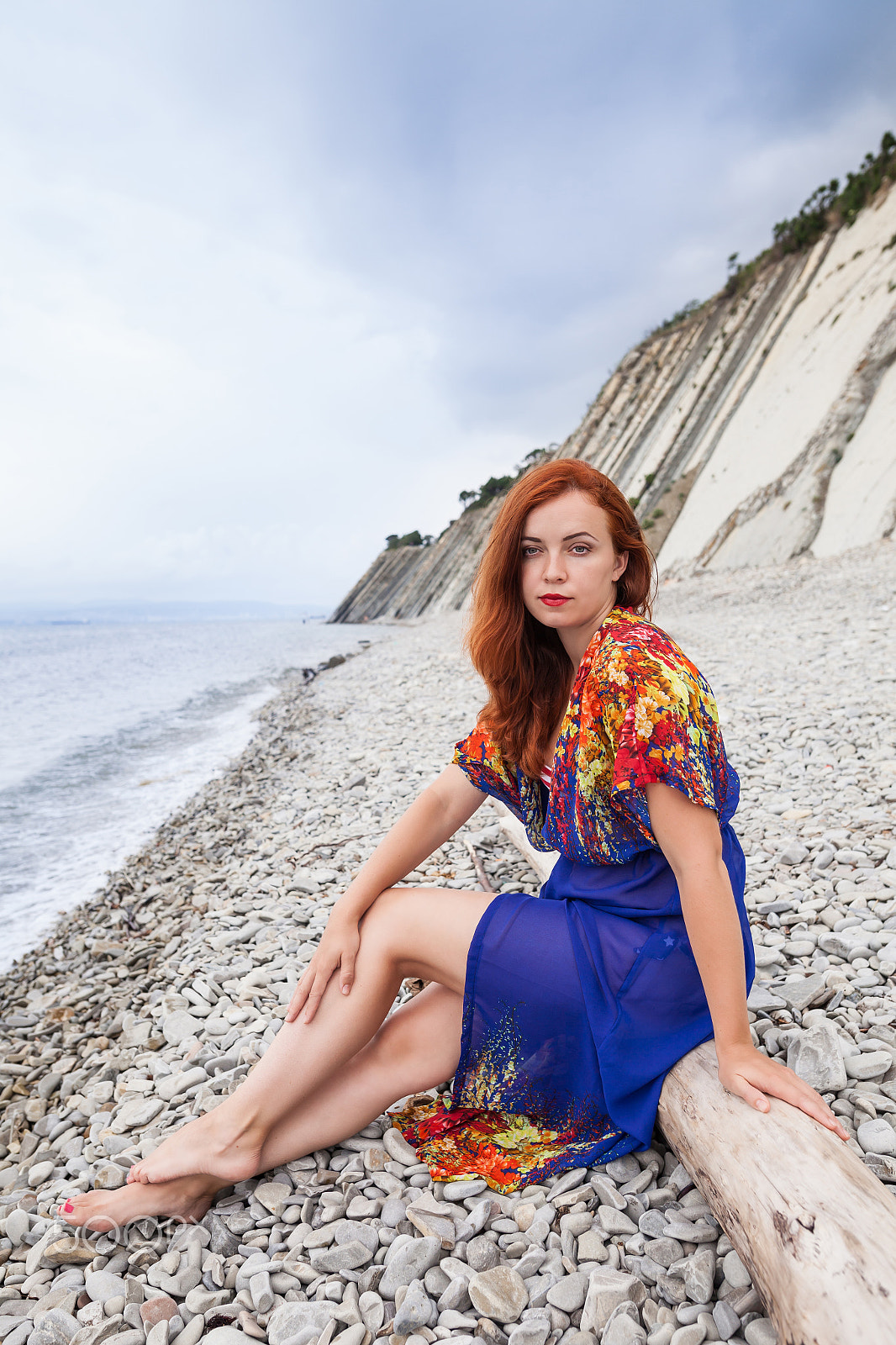 Sigma 24mm F1.4 DG HSM Art sample photo. Young woman on the stone beach photography