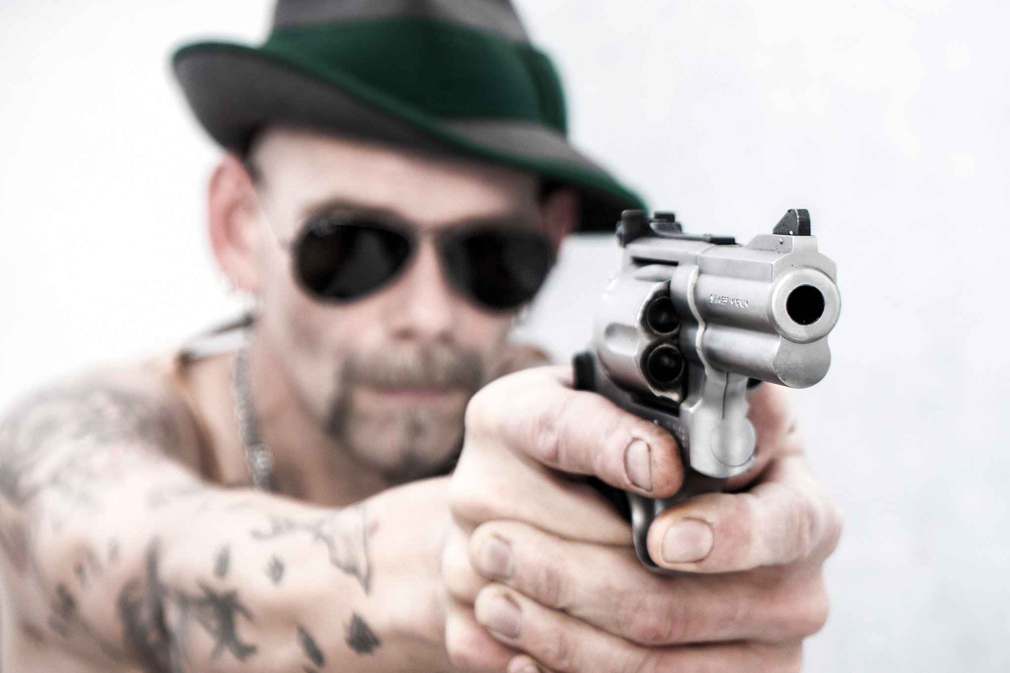 Sony Alpha DSLR-A700 sample photo. Man with gun photography