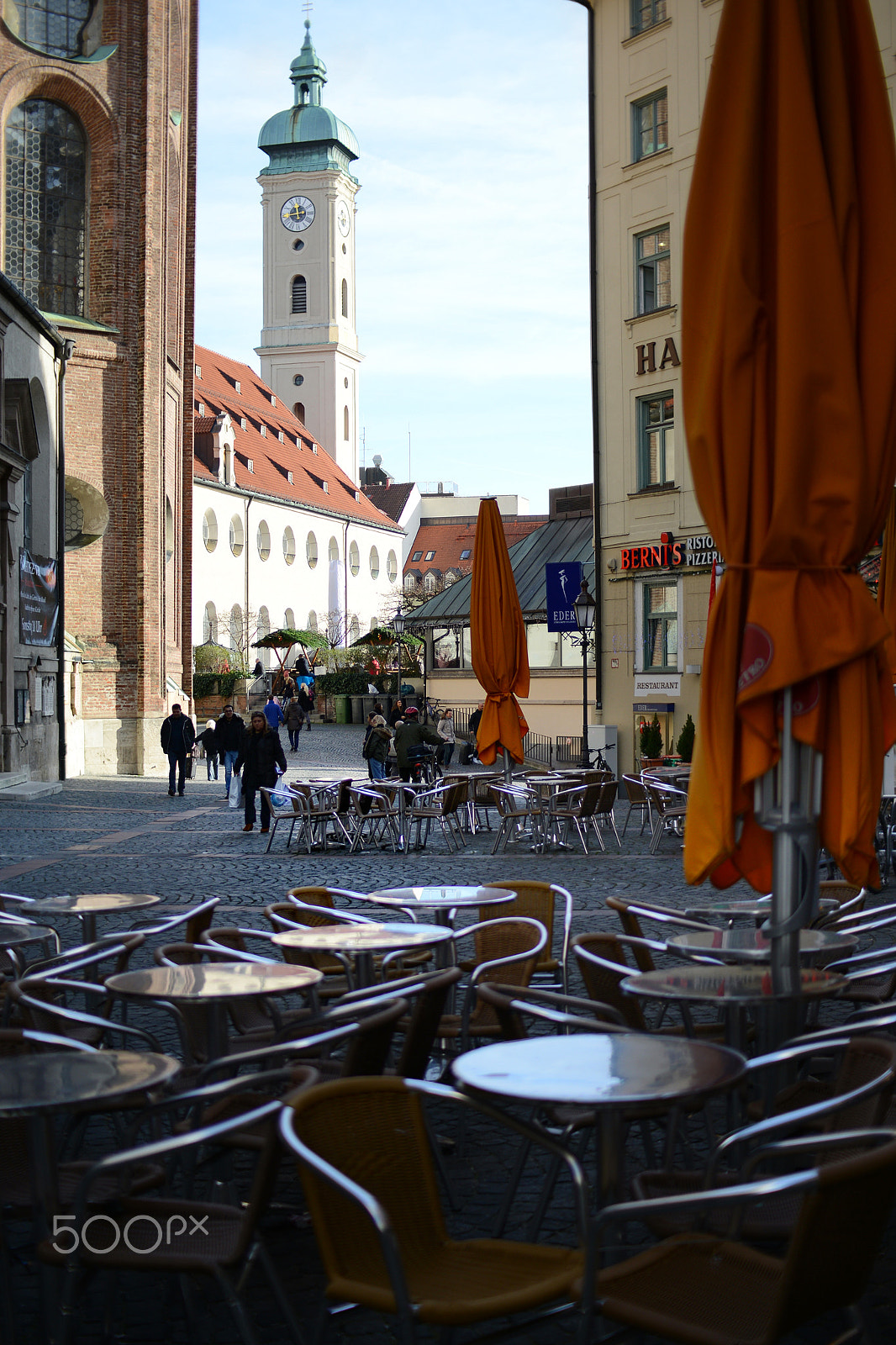 Nikon D800 + Sigma 30mm F1.4 EX DC HSM sample photo. People walking along the st. peter church towards viktualienmark photography