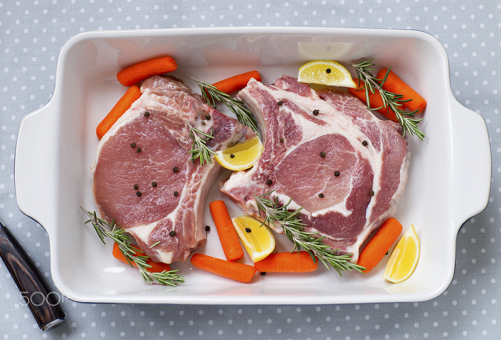 Sony SLT-A37 + Sony 50mm F1.4 sample photo. Raw steak with carrots, rosemary herbs, lemon, salt and pepper i photography