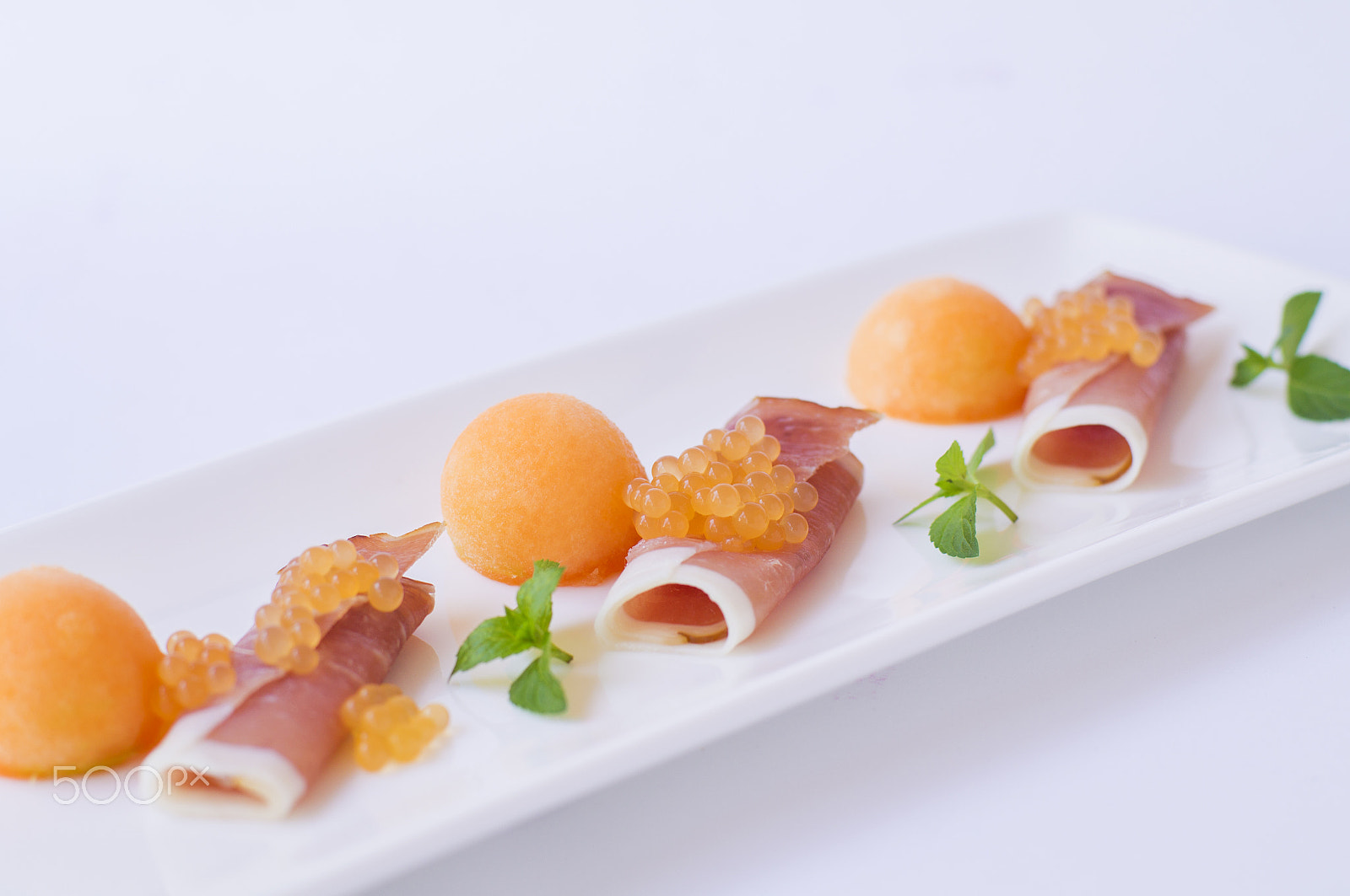 Sony SLT-A37 + Sony 50mm F1.4 sample photo. Molecular melon caviar, prosciutto and fresh melon photography