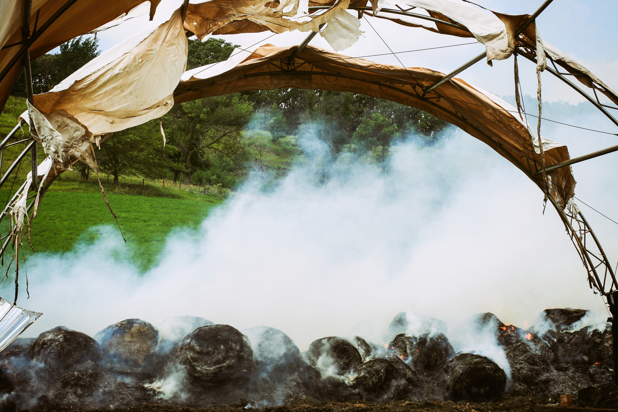 Canon EF 28-80mm f/2.8-4L sample photo. Burning bales, burning barn photography