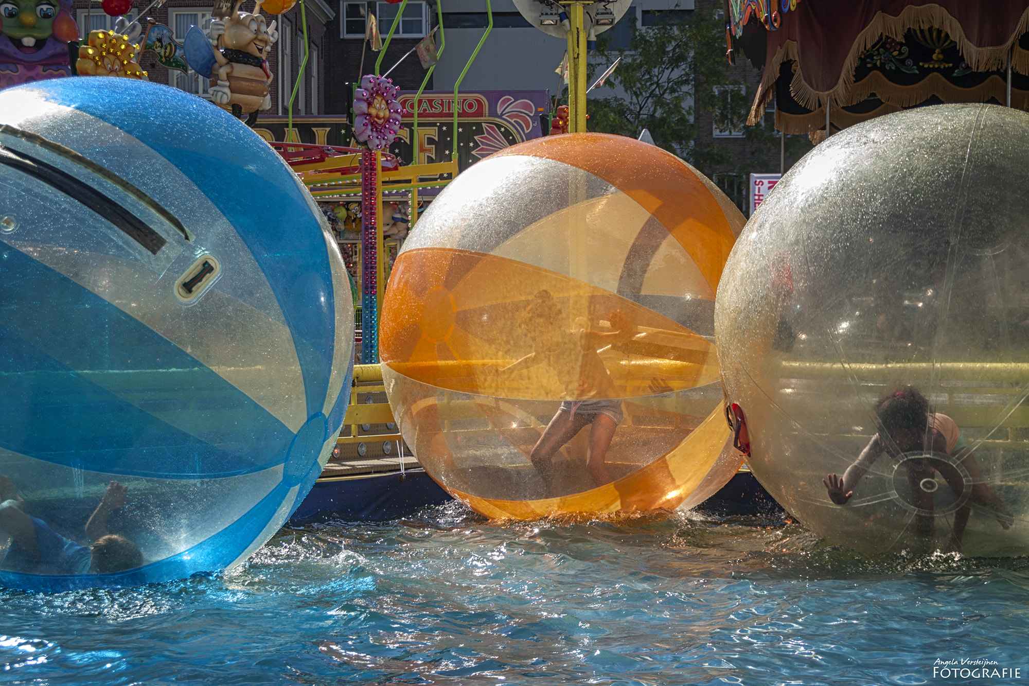 Sigma 18-250mm F3.5-6.3 DC OS HSM sample photo. At the funfair photography