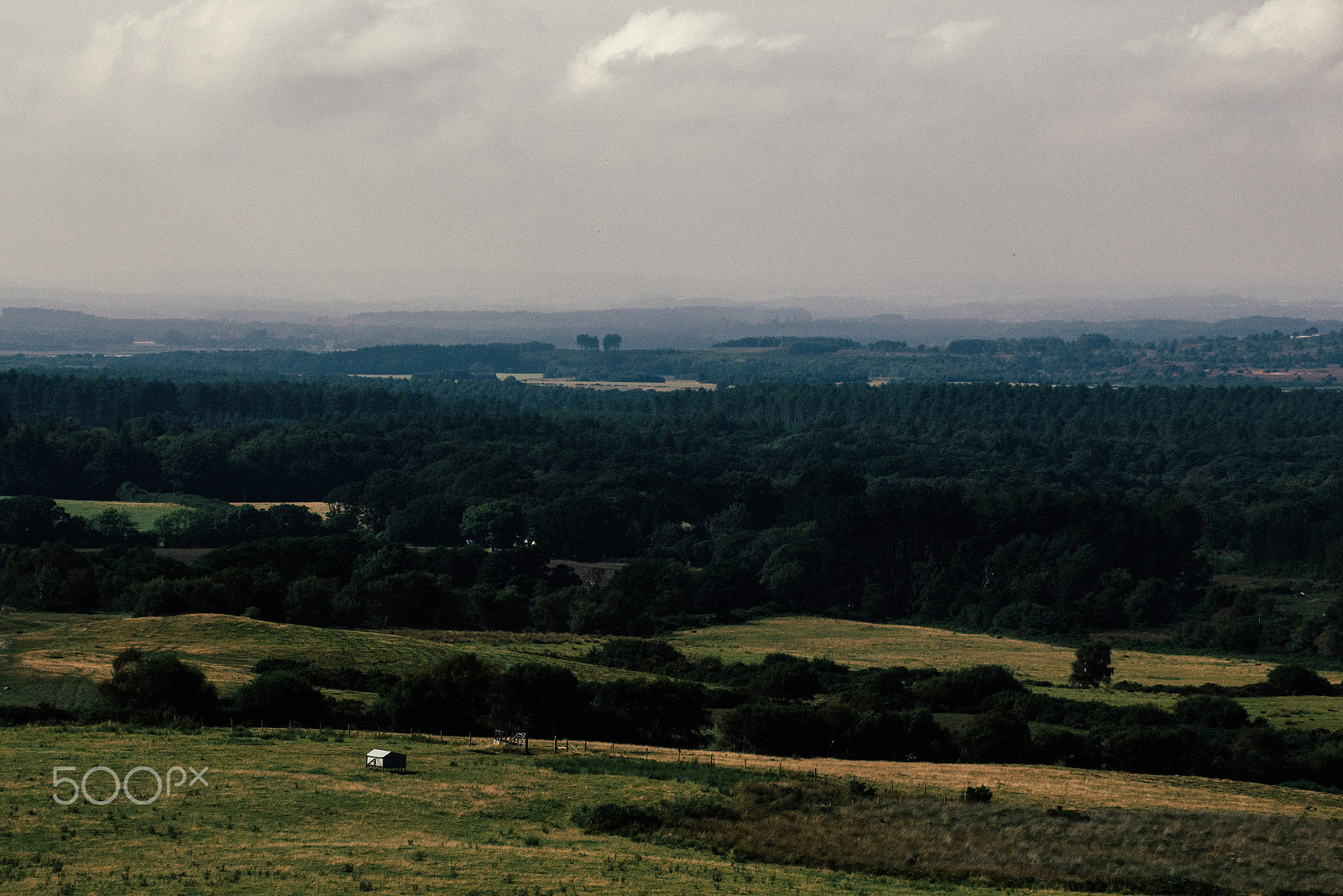 Canon EF 75-300mm F4.0-5.6 IS USM sample photo. Rain clouds in the distance photography