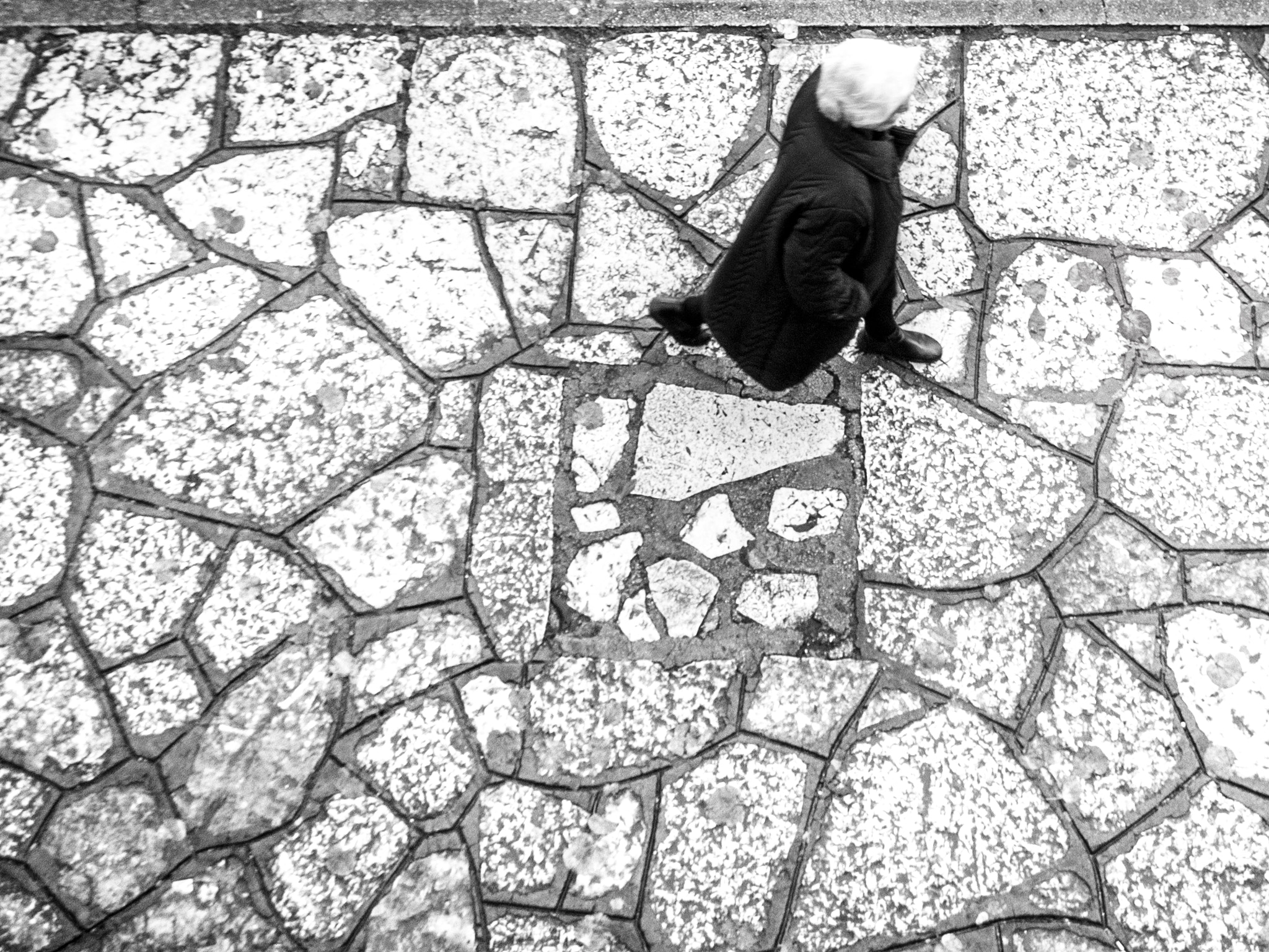 LUMIX G VARIO PZ 14-42/F3.5-5.6 sample photo. Walking in the black and white photography