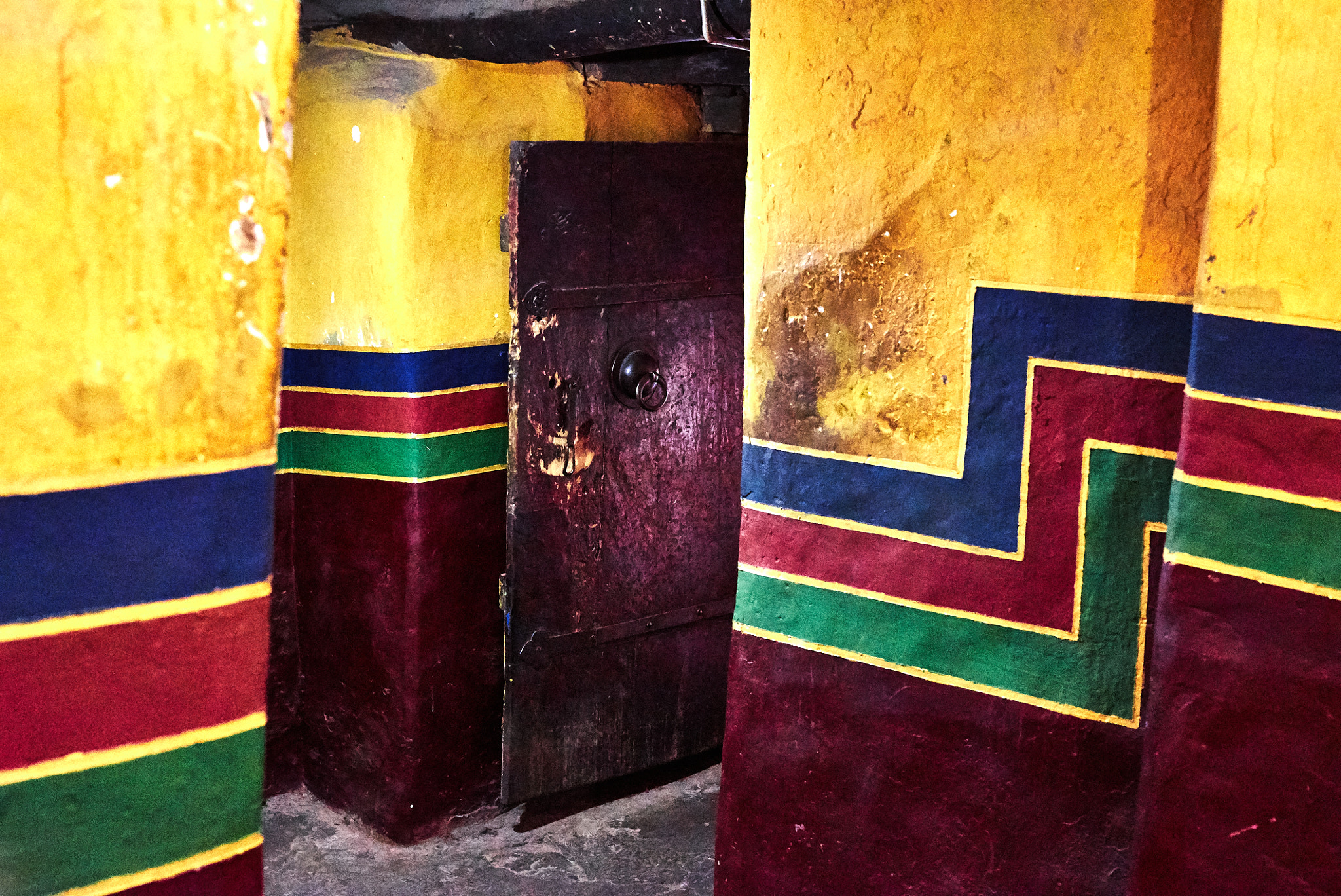 E 50mm F2 sample photo. A door inside jokhang temple photography