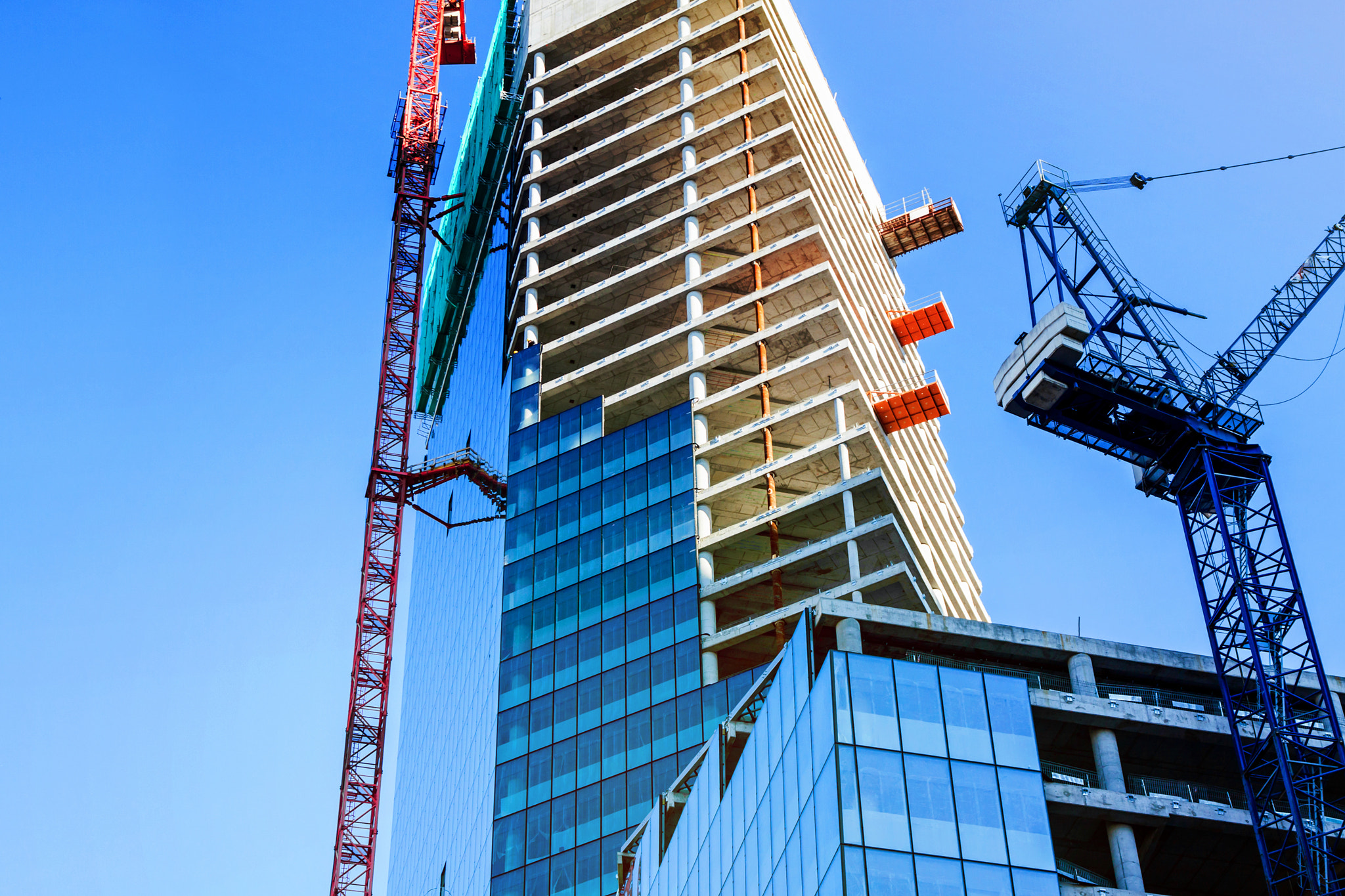 Sigma 17-70mm F2.8-4 DC Macro OS HSM sample photo. Modern office tower building construction photography