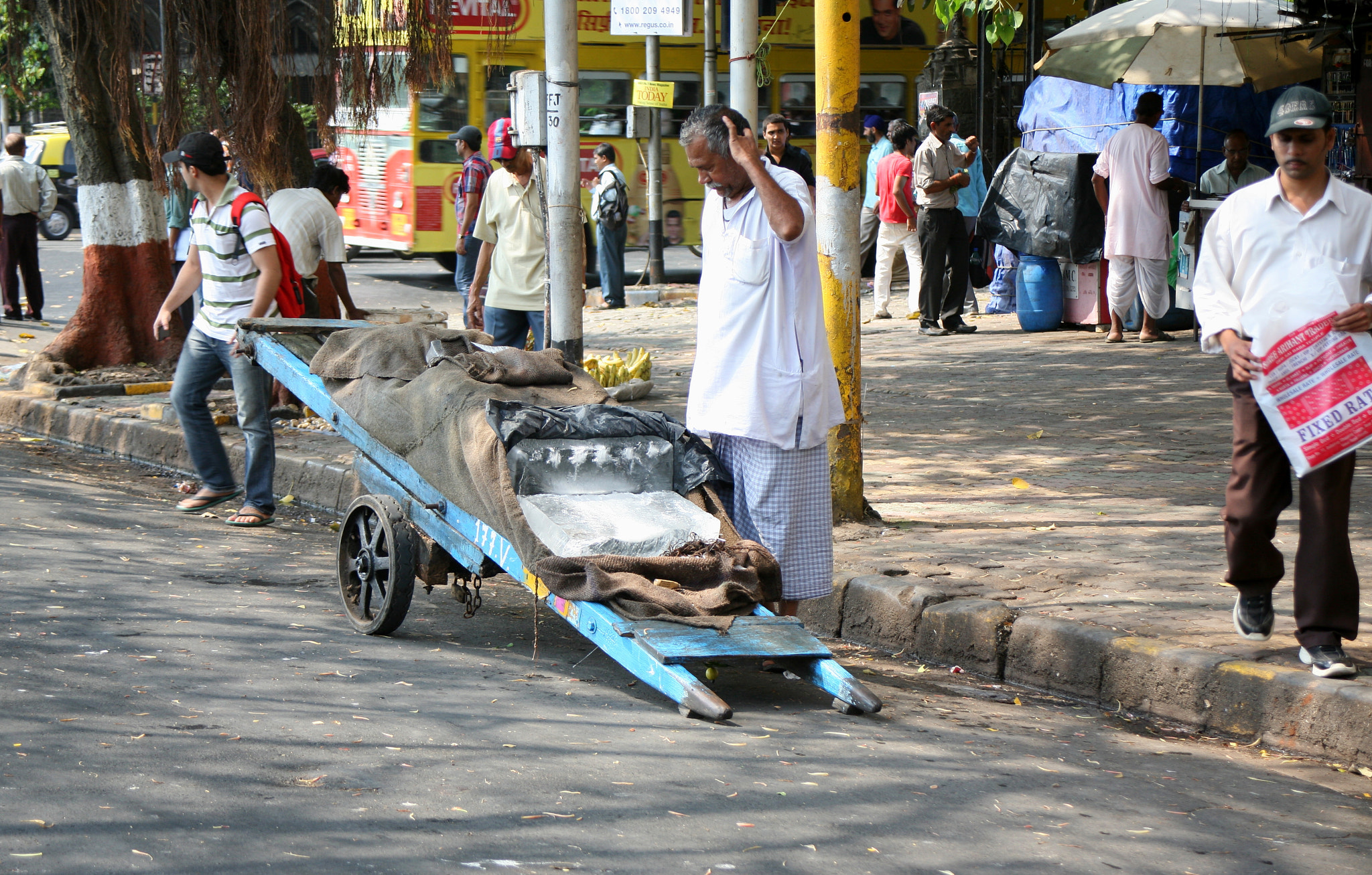 Canon EF 28-80mm f/3.5-5.6 sample photo. Ice seller photography