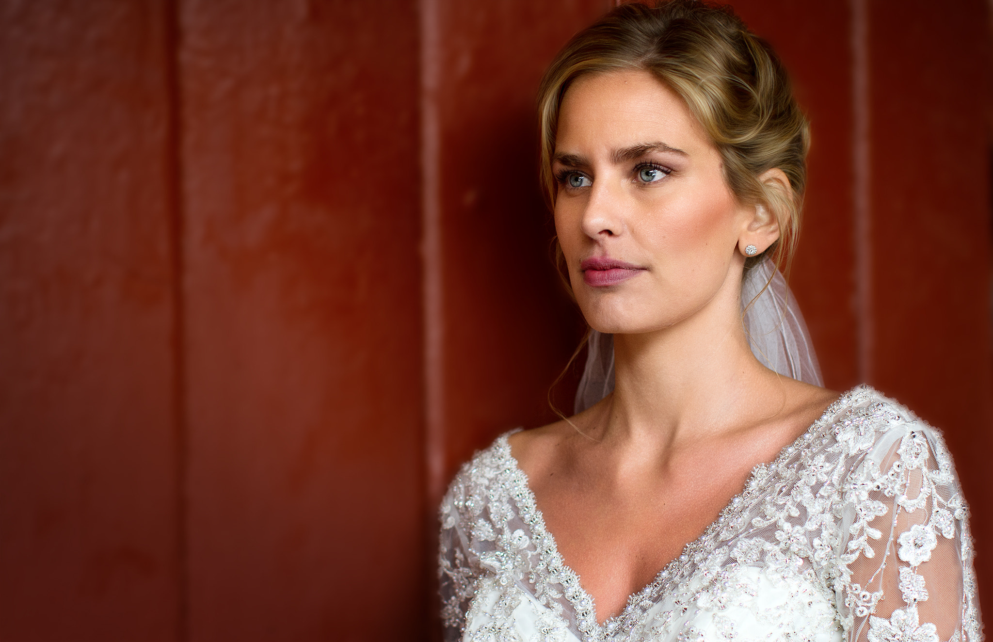 Canon EOS 7D + Canon EF 50mm F1.2L USM sample photo. Bride and a red wall photography