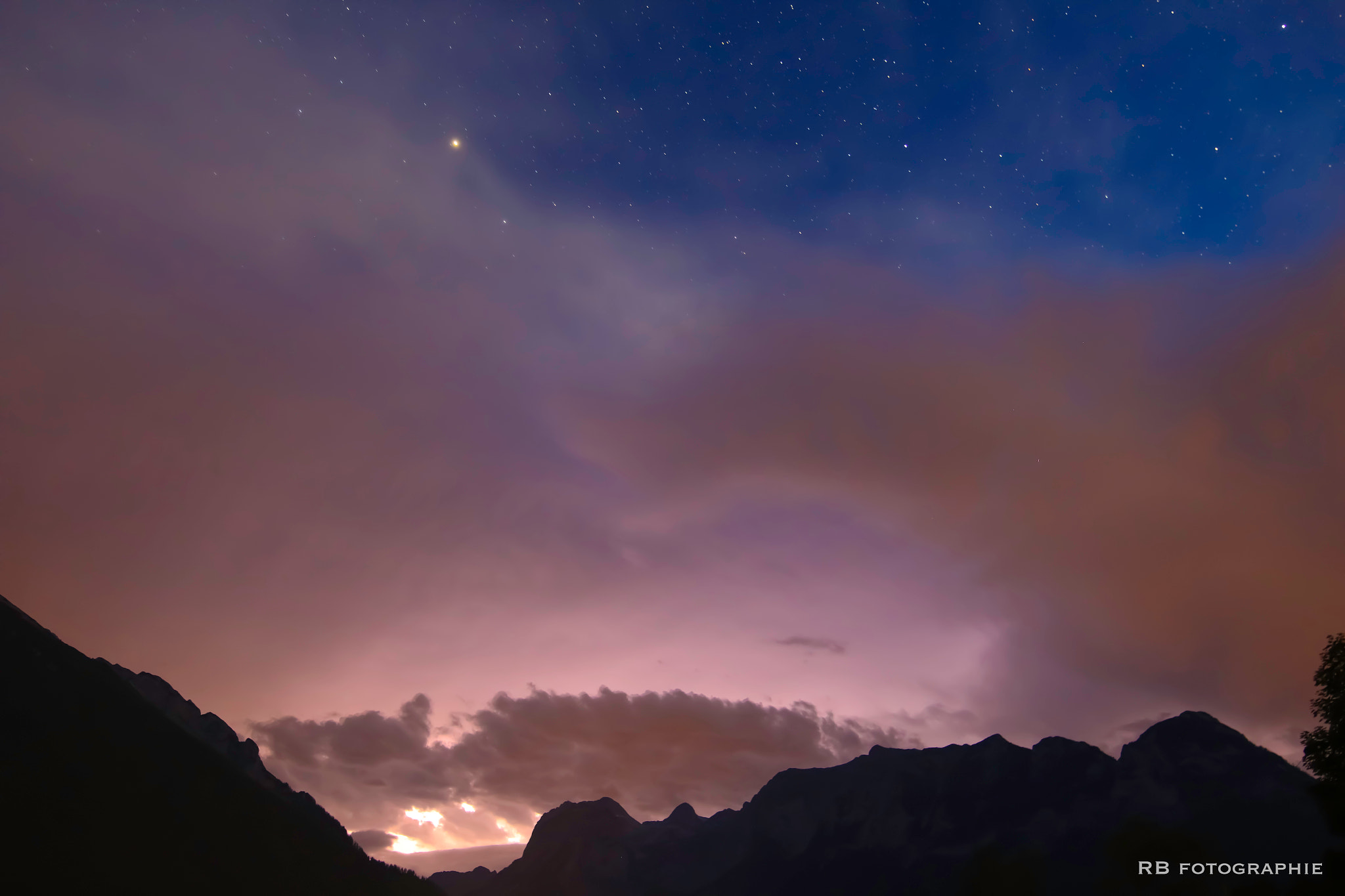 Canon EOS 70D + Canon EF 300mm f/2.8L sample photo. Just a lightning storm behind the clouds and mountains photography