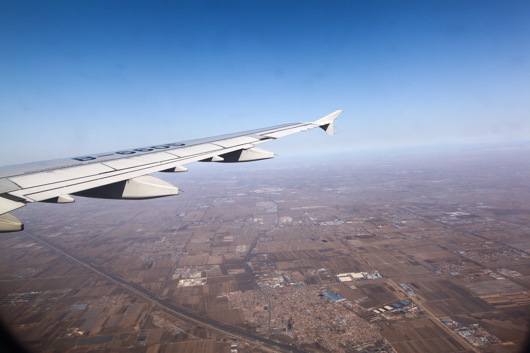 Canon EOS 500D (EOS Rebel T1i / EOS Kiss X3) sample photo. The flight to beijing photography