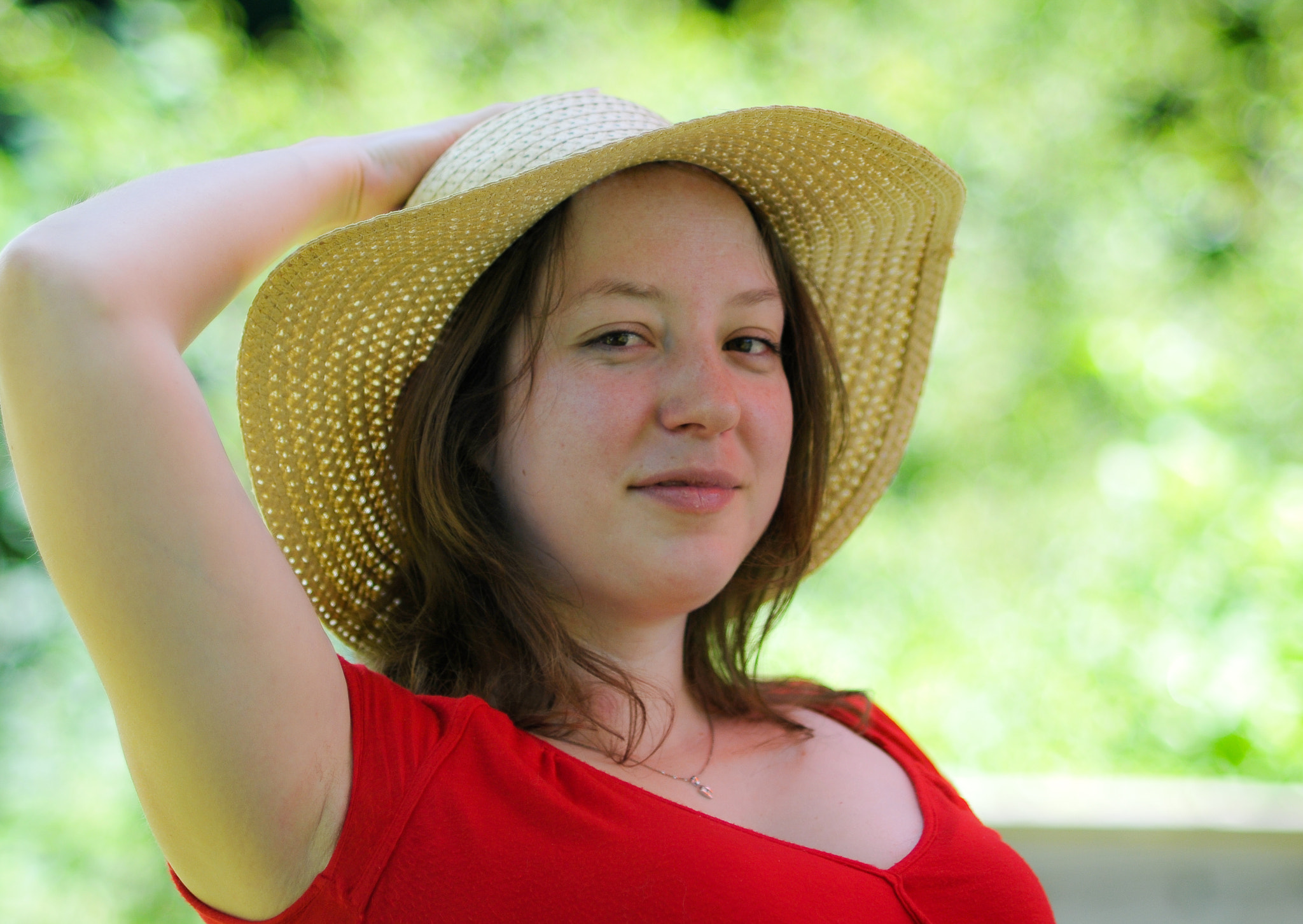 AF Nikkor 85mm f/1.8 sample photo. The girl and the hat photography