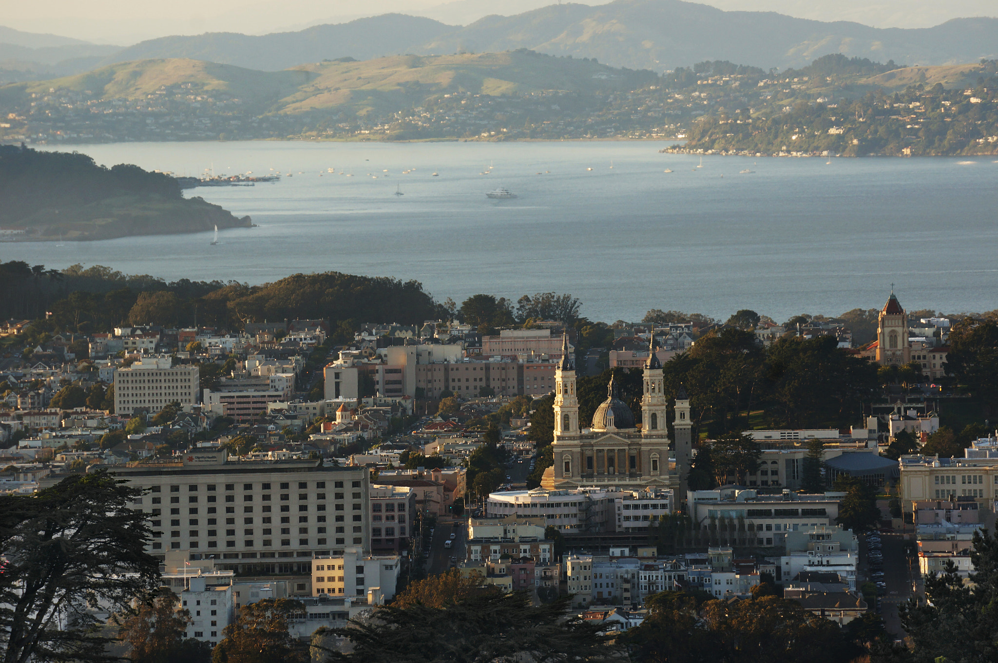 Sony Alpha NEX-5T + Sony E 55-210mm F4.5-6.3 OSS sample photo. Saint ignatius church, san francisco photography