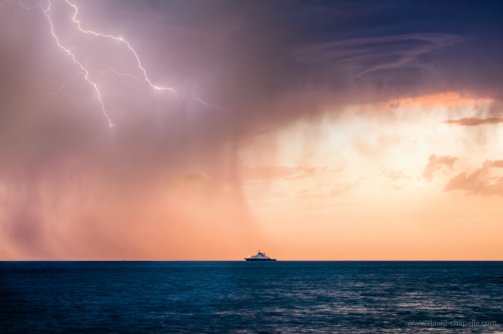 Fujifilm X-E1 + Fujifilm XF 55-200mm F3.5-4.8 R LM OIS sample photo. Boat under storm photography