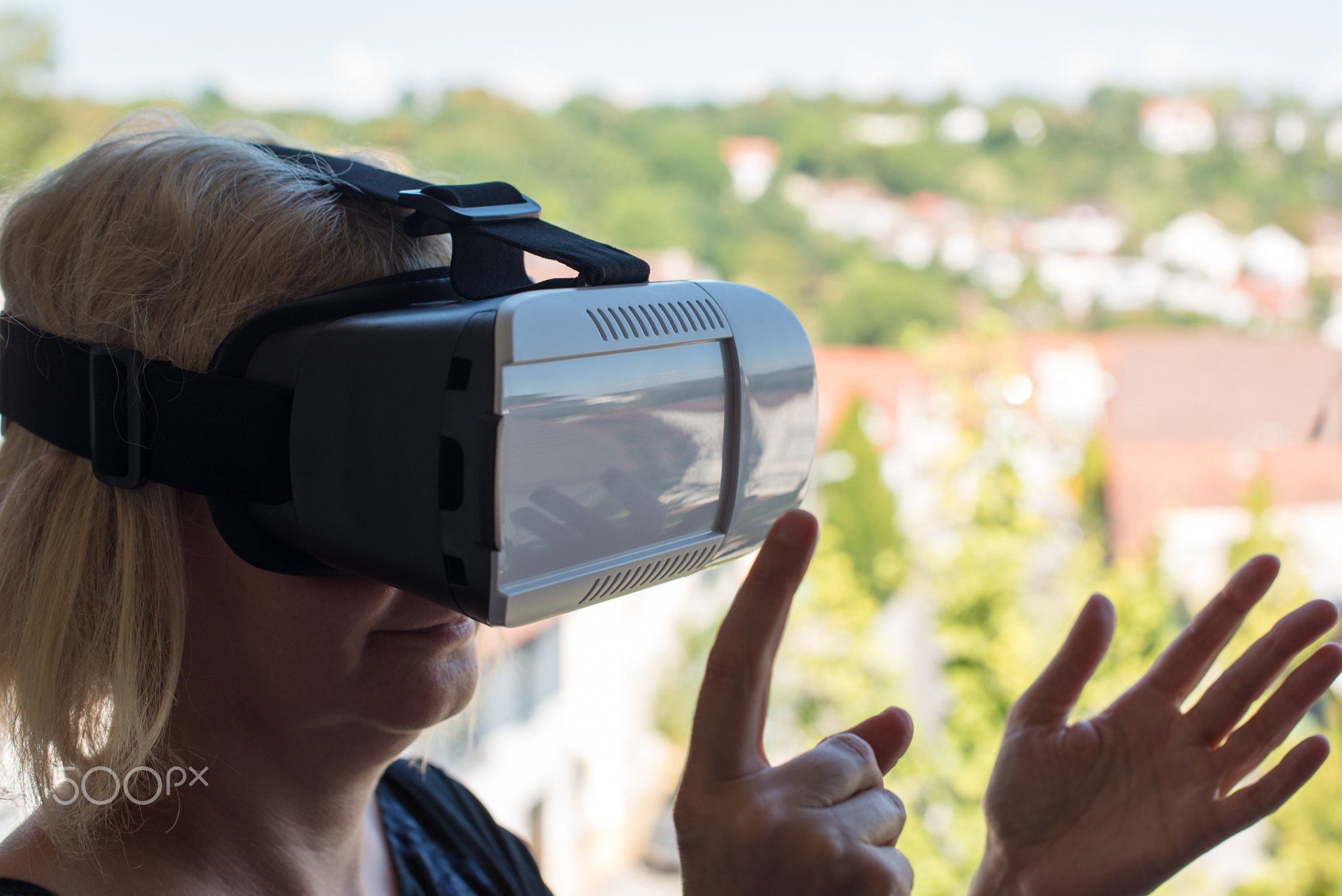 Businesswoman using virtual reality glasses