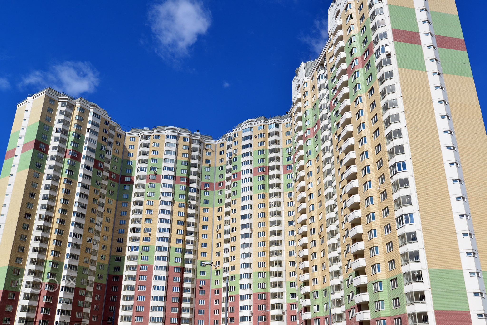Modern multistory residential buildings in sunny day