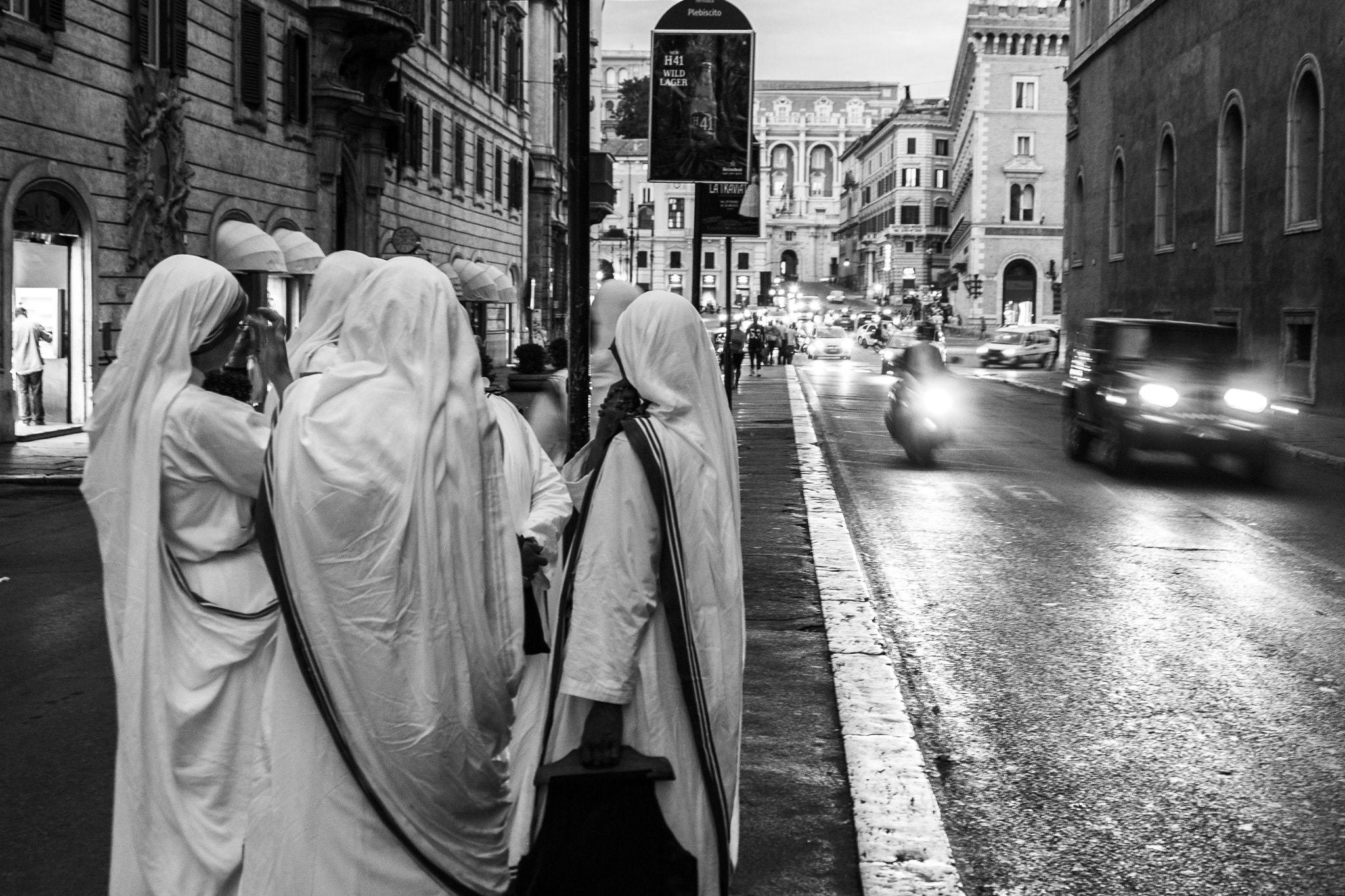 Canon EOS 1100D (EOS Rebel T3 / EOS Kiss X50) + Canon EF 24-105mm F4L IS USM sample photo. Nuns in the city i photography
