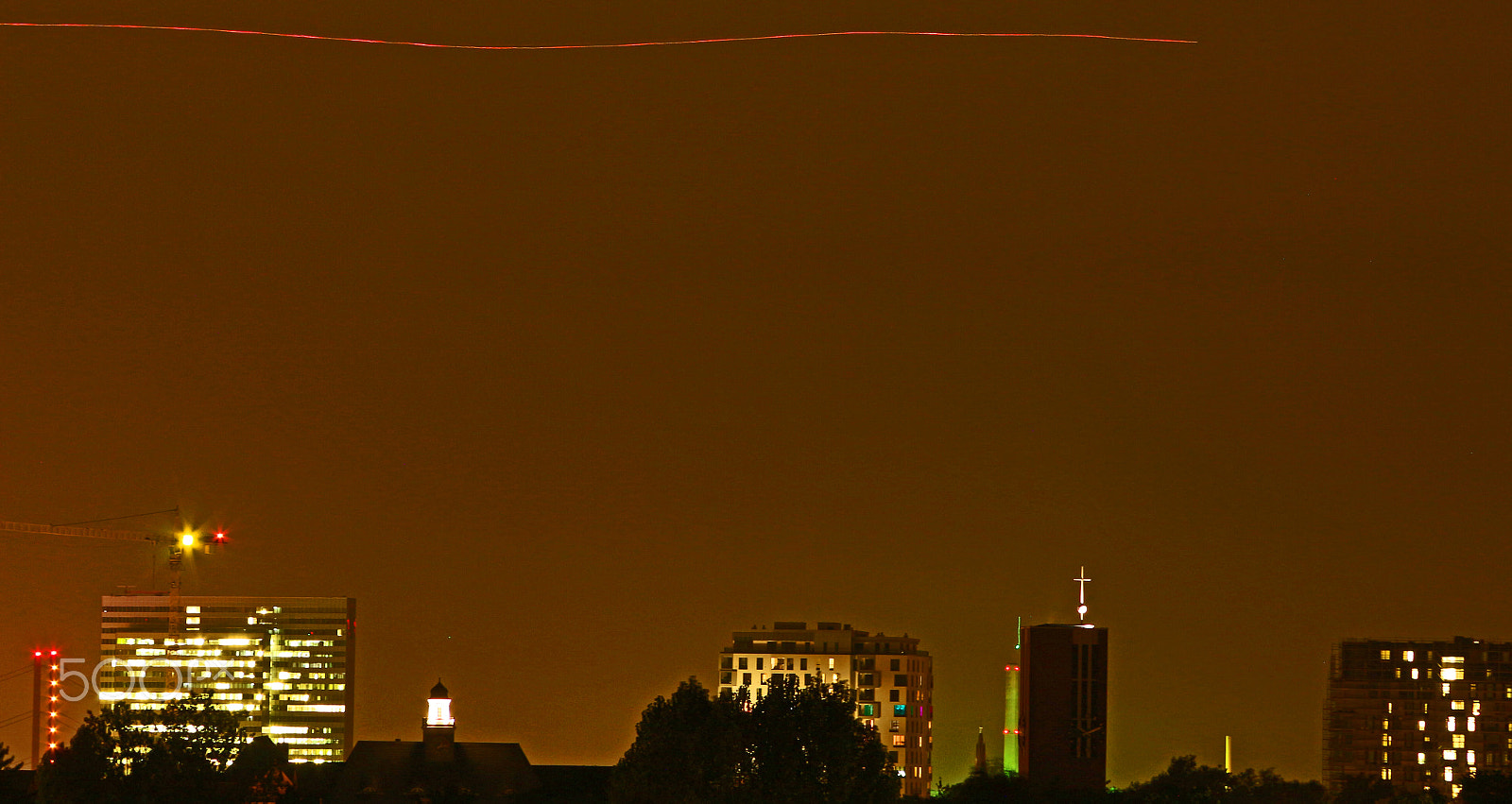 Canon EF 28-135mm F3.5-5.6 IS USM sample photo. D'dorf at night... (& an airplane on its descent) photography
