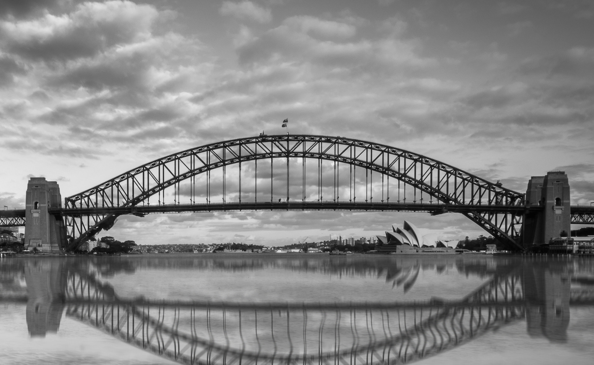 Olympus OM-D E-M1 + OLYMPUS M.12-50mm F3.5-6.3 sample photo. Reflection of sydney harbour bridge photography
