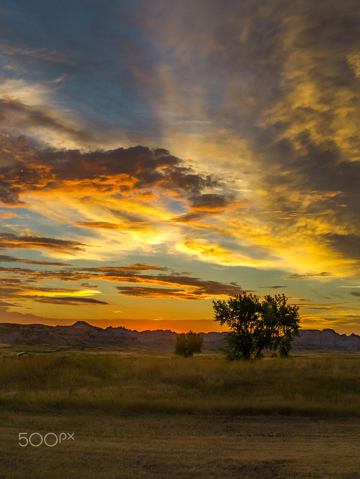 Panasonic Lumix DMC-GX1 sample photo. Sunset, badlands national park photography