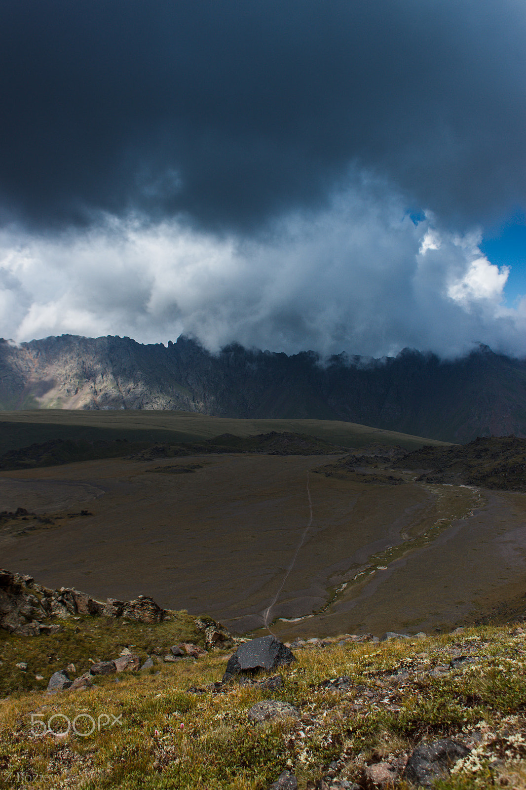 Sigma 18-50mm F2.8-4.5 DC OS HSM sample photo. Airfield between the mountains photography