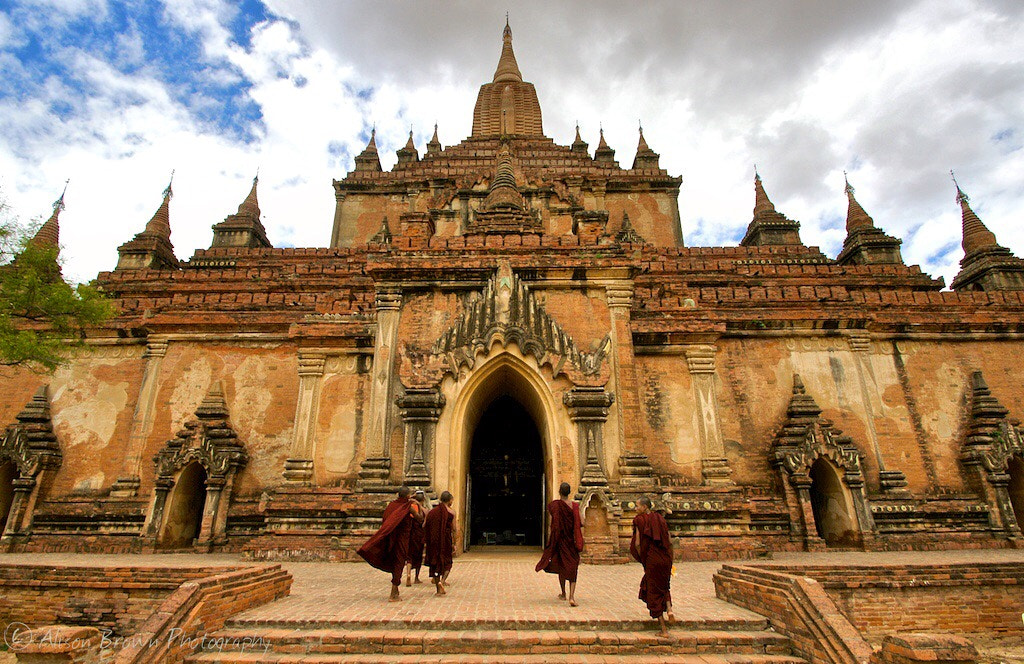 Sony Alpha DSLR-A700 sample photo. Monks enter a temple in old bagan, myanmar to pray photography
