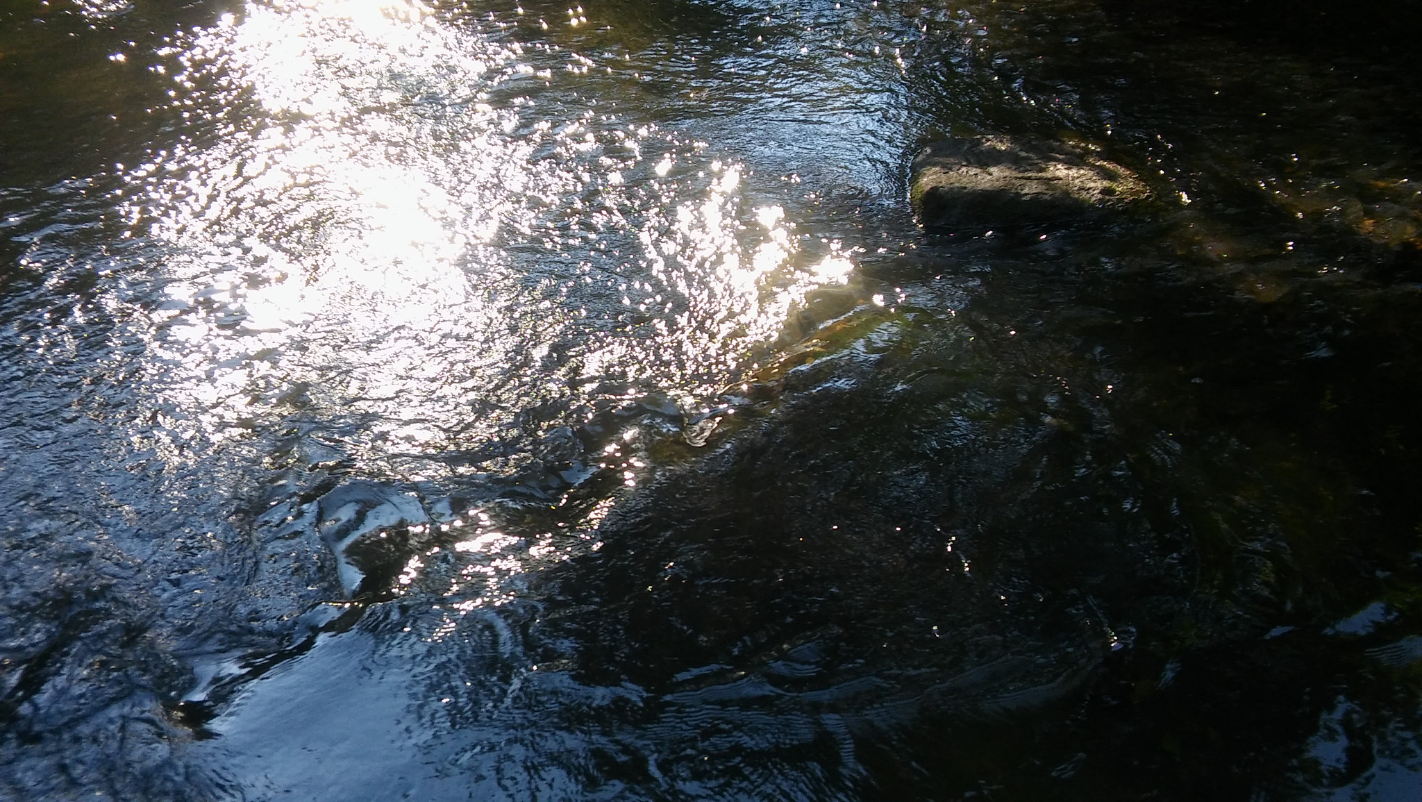 LG SPIRIT 4G LTE sample photo. Water over rocks photography