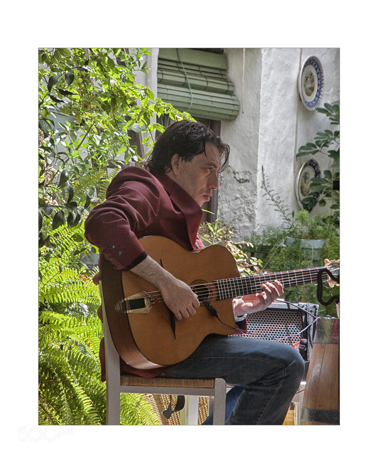 Sigma 18-125mm F3.8-5.6 DC OS HSM sample photo. The guitar player photography