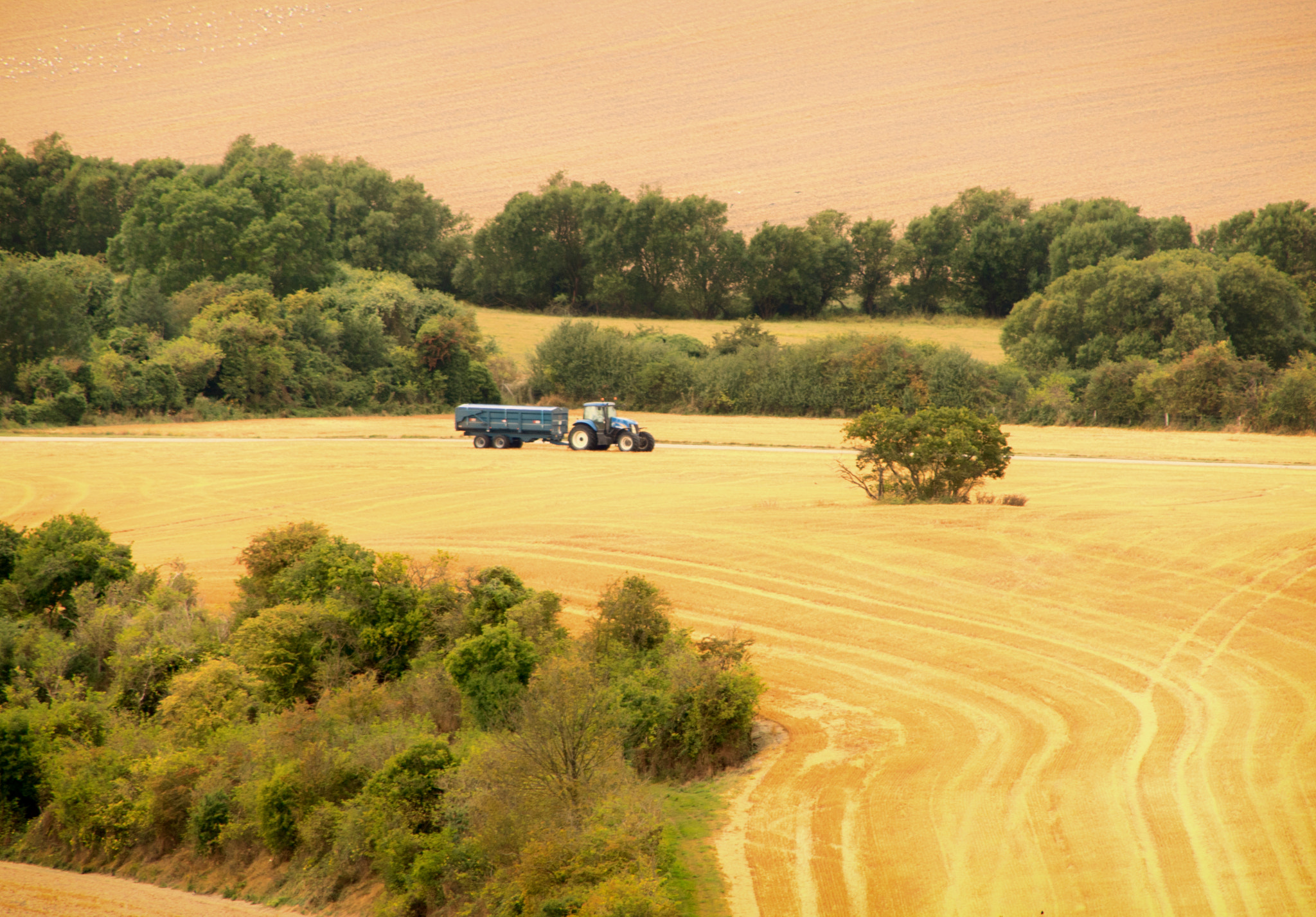 EF75-300mm f/4-5.6 sample photo. A tractor working the fields photography