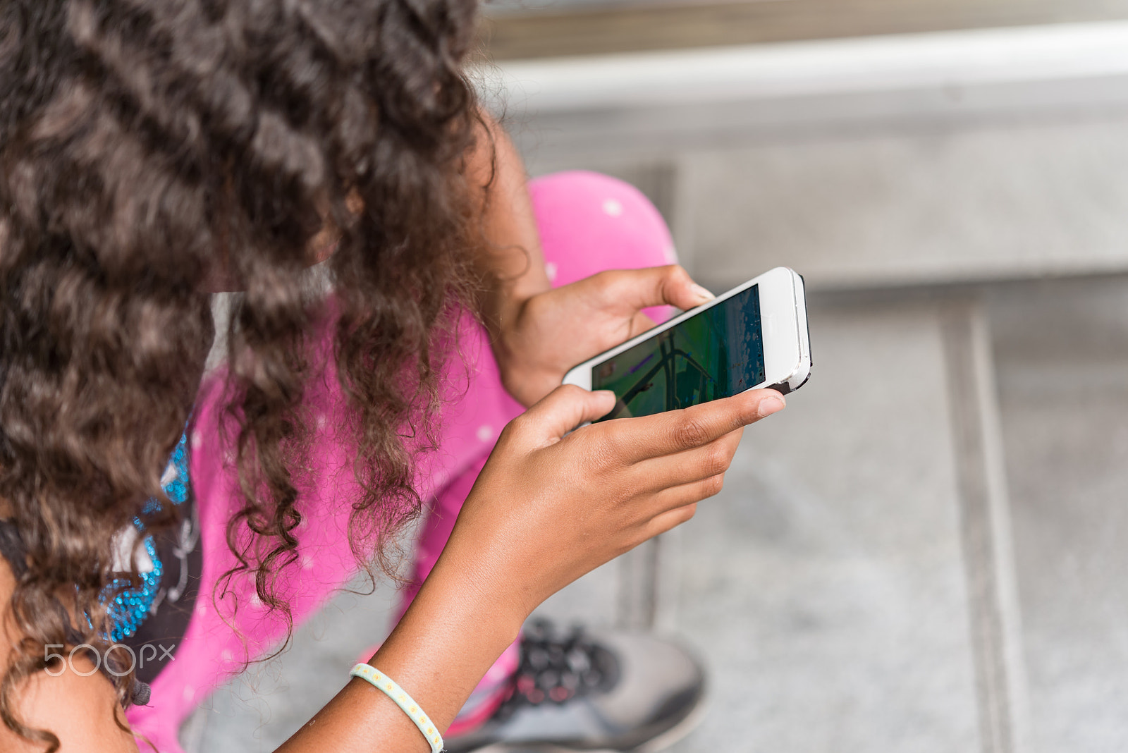 Nikon AF-S Micro-Nikkor 60mm F2.8G ED sample photo. App game playing child with smartphone outside photography