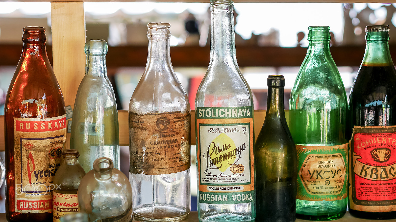 Panasonic Lumix DMC-G7 + Olympus M.Zuiko Digital 45mm F1.8 sample photo. Vintage bottles at flea market photography