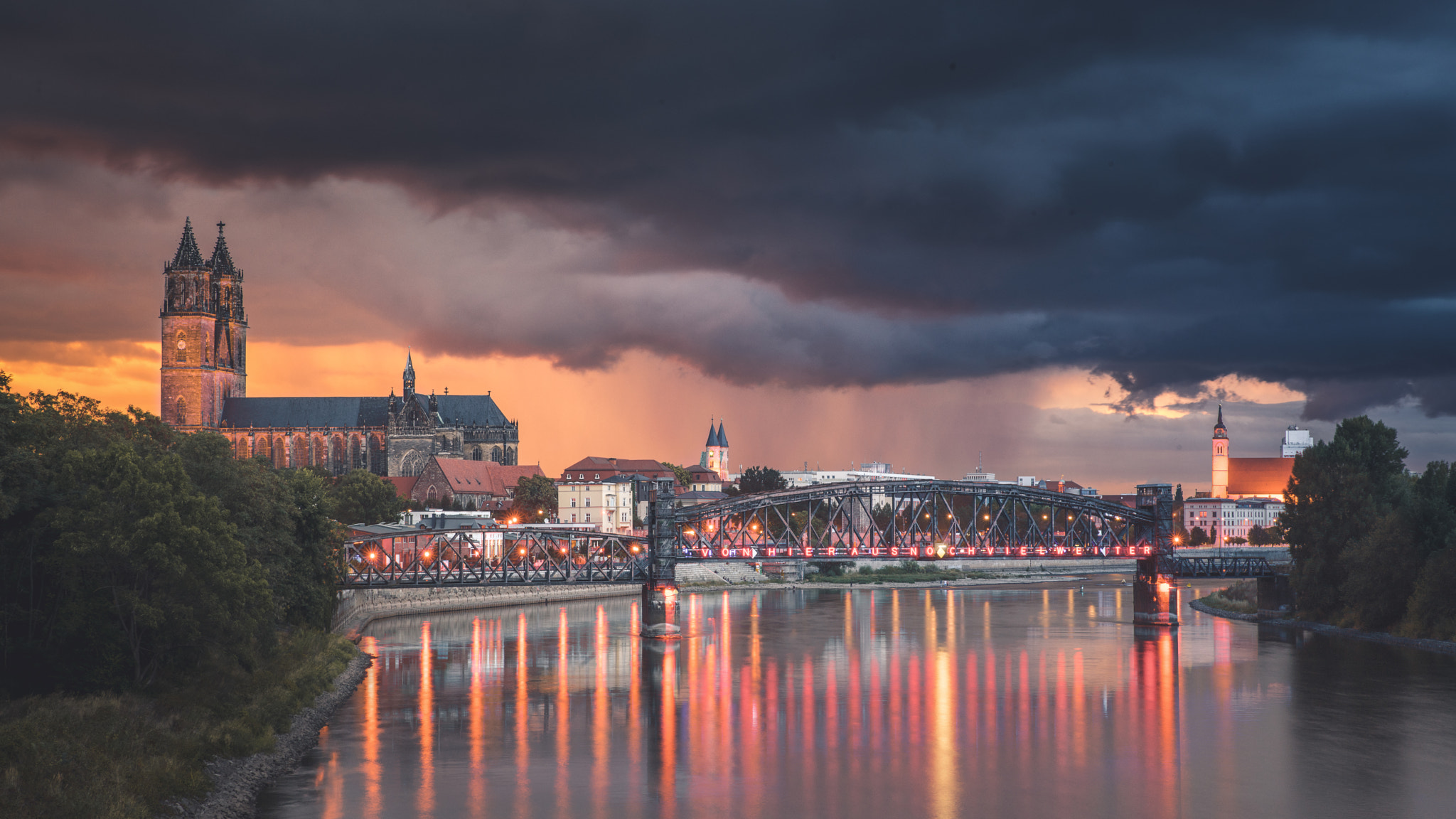24-70mm F2.8 G SSM OSS sample photo. Dramatic sunset over magdeburg photography