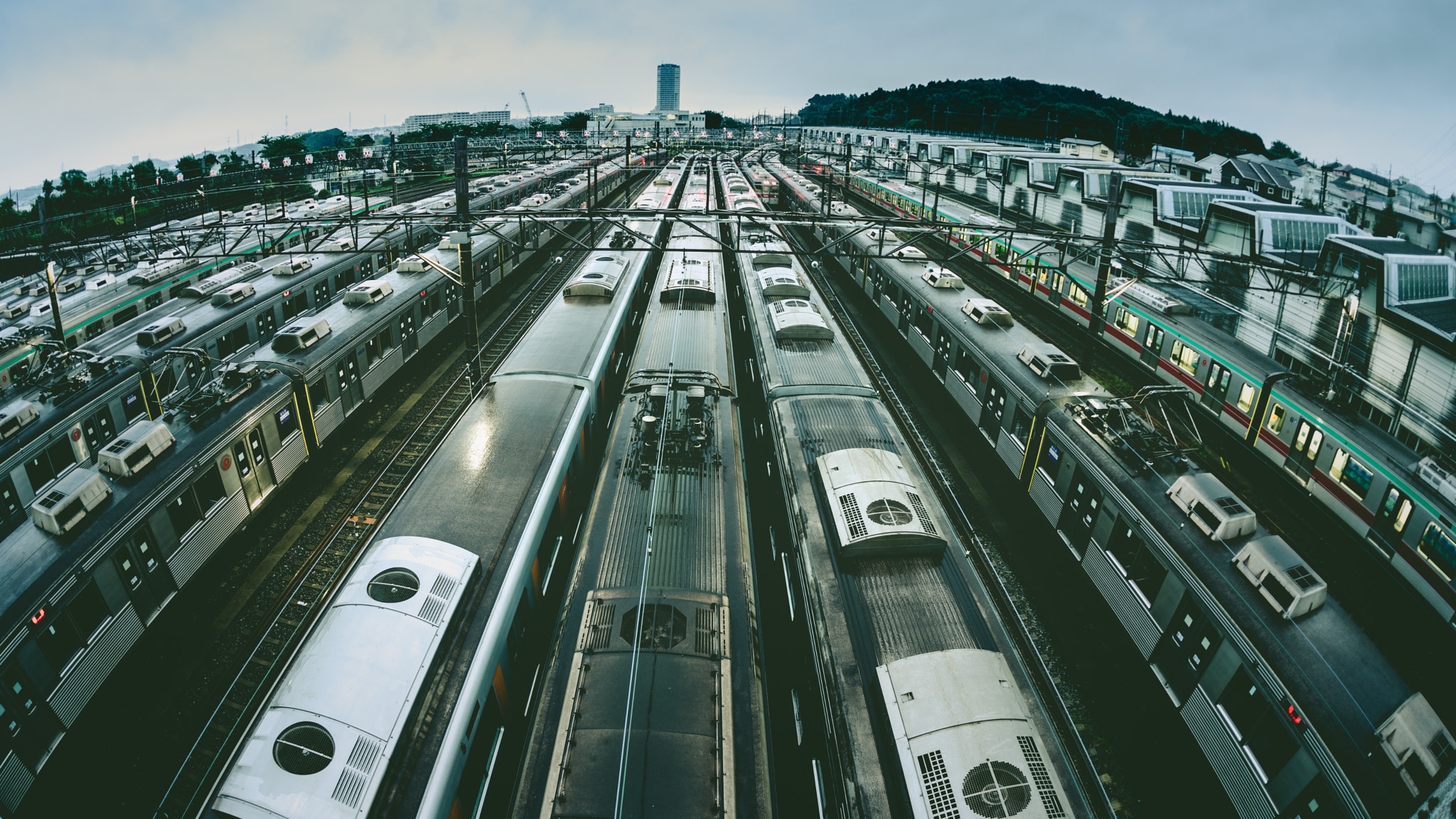 Sony a7 II + Sigma 15mm F2.8 EX DG Diagonal Fisheye sample photo. Waiting trains photography